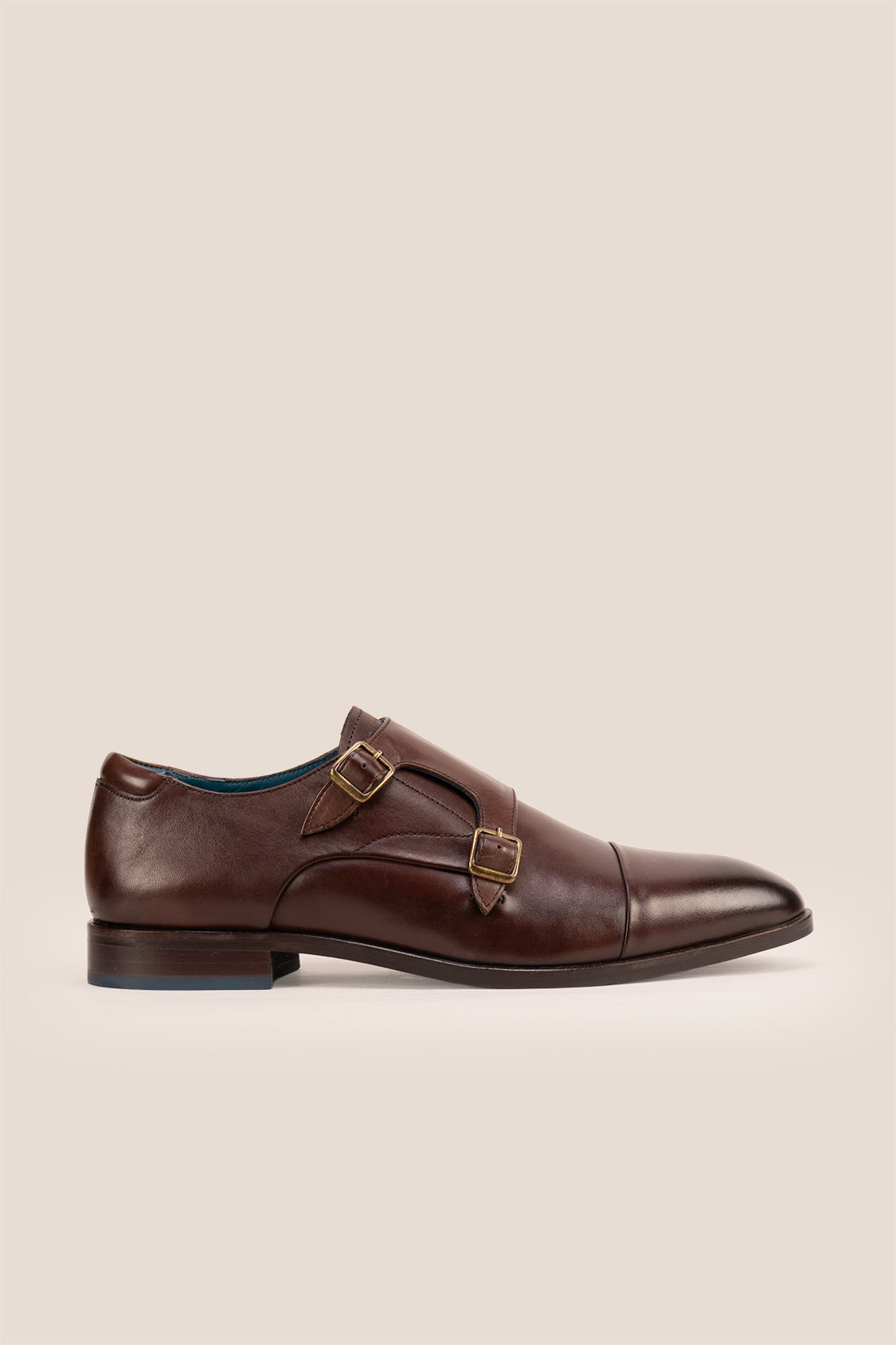 Hadley brown monk strap leather men’s shoes with single buckle design, crafted in high-quality leather and finished with a sleek leather sole.