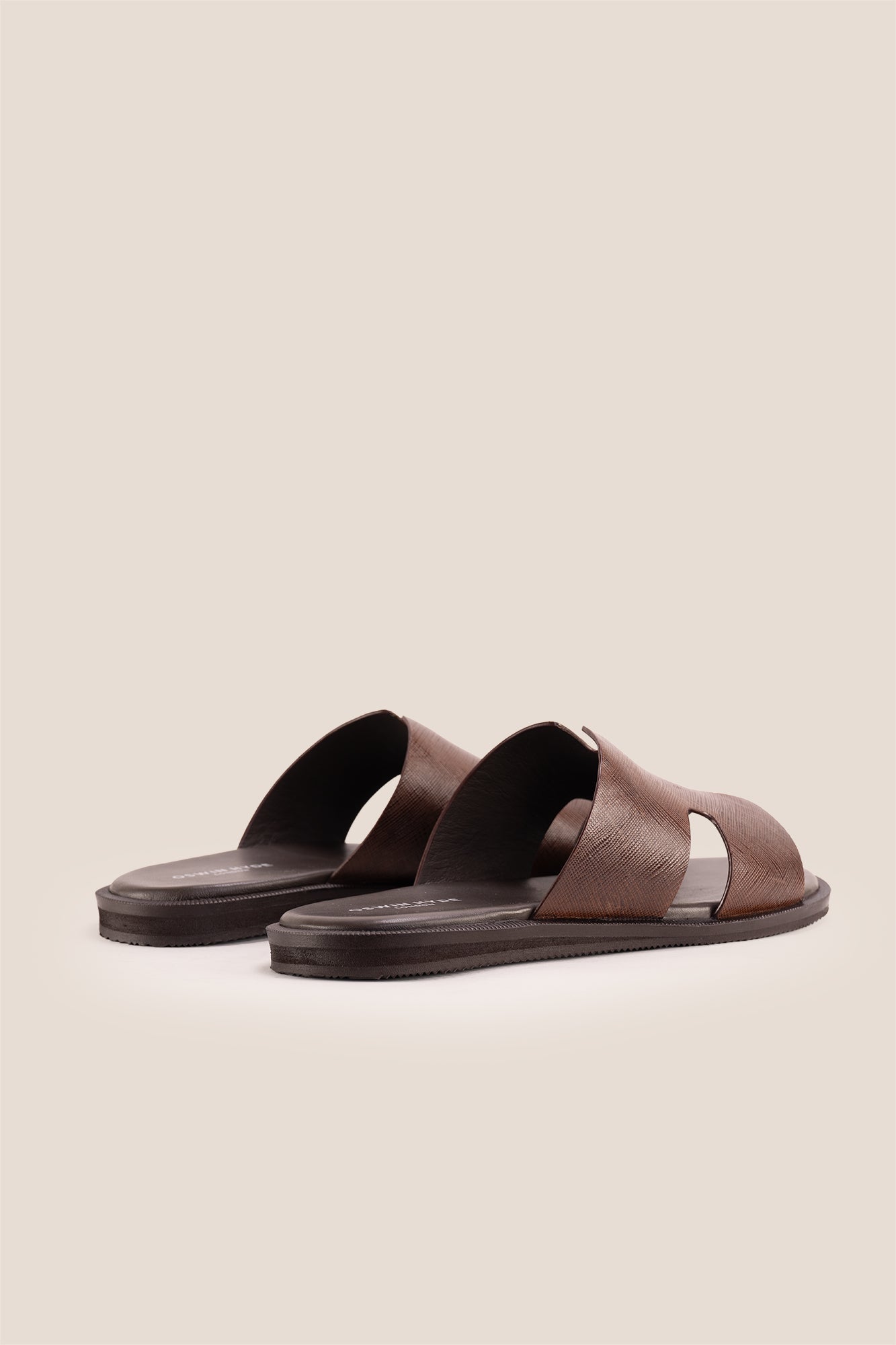 Men’s Phoenix Brown sandals in high-quality brown leather featuring a minimalist hyde strap H-frame design.