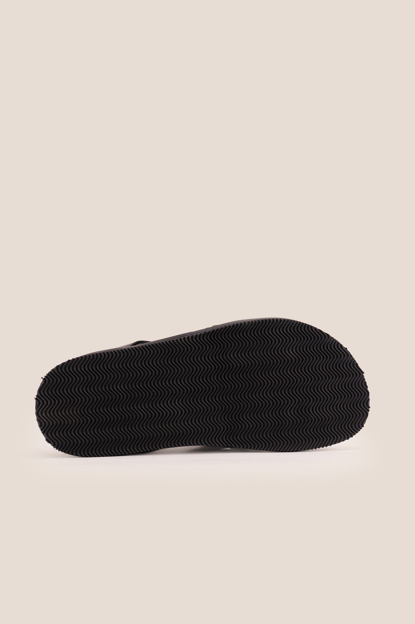 Men’s Rowan Brown slide sandals featuring a textured brown suede X-strap design and a cushioned sole.