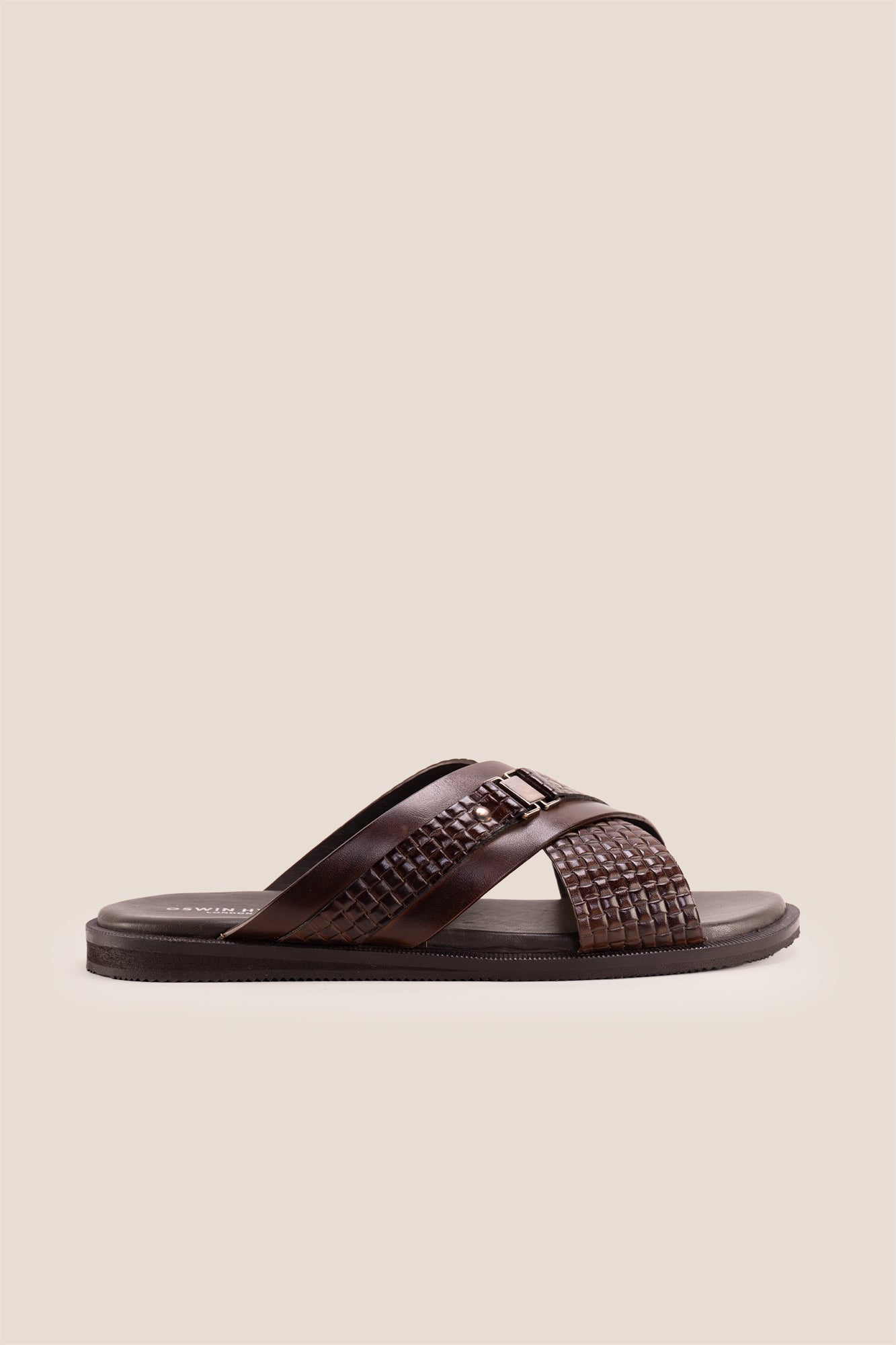 Aiden Brown men’s leather sandals with a unique woven criss-cross strap design.