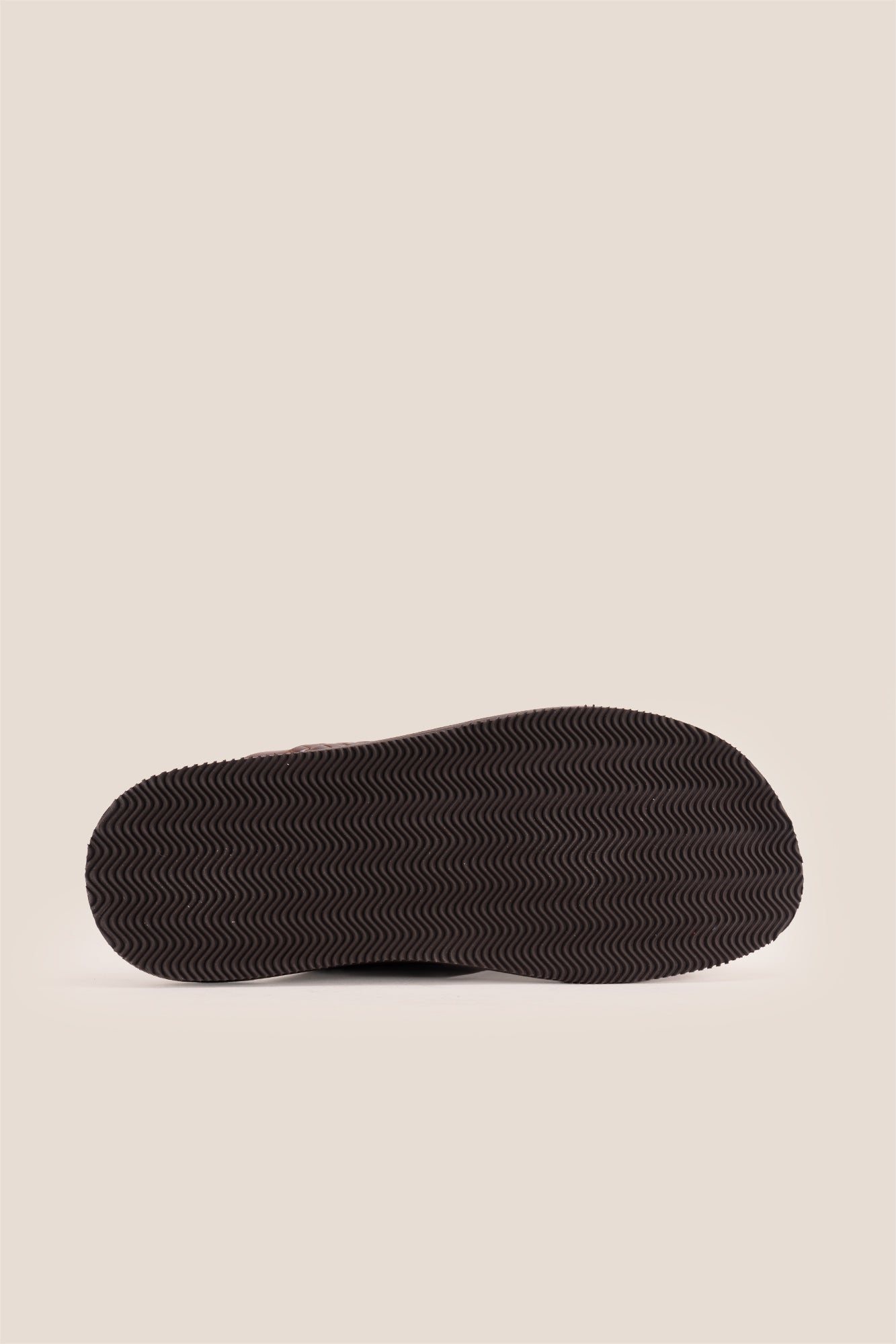 Aiden Brown men’s leather sandals with a unique woven criss-cross strap design.