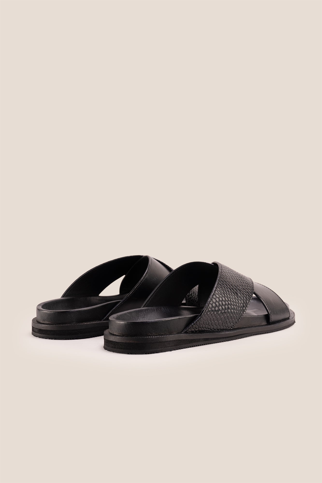Nyle Black cross strap sandals for men by Oswin Hyde with sleek design and comfortable fit