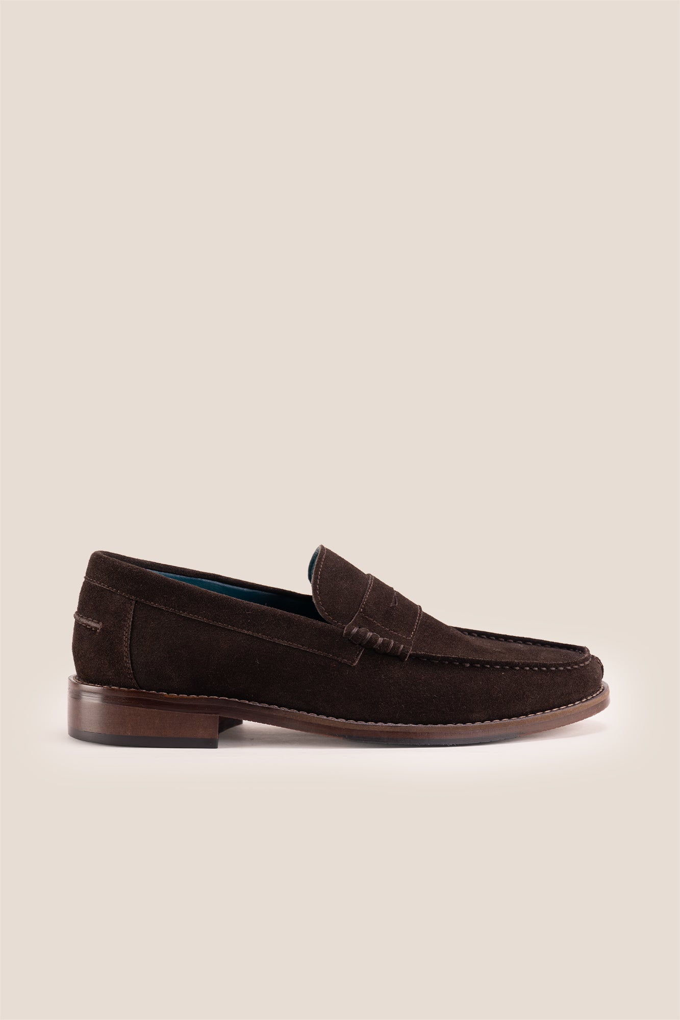Peter Brown Suede leather penny loafers for men. Classic and stylish, these loafers provide comfort, durability, and a refined look for any occasion.