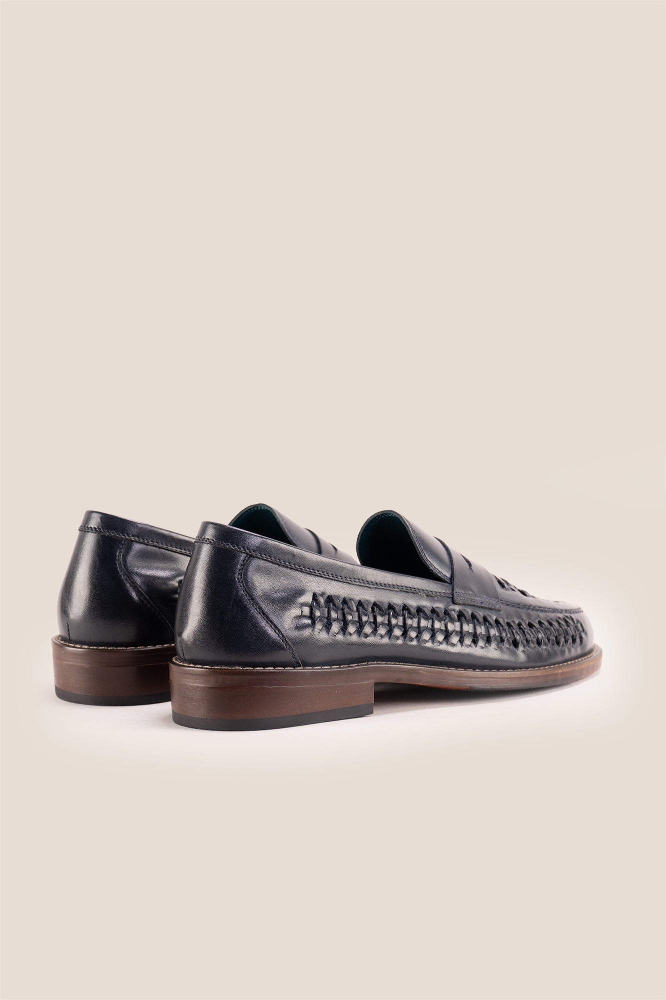 Finley navy woven leather loafers for men, featuring premium craftsmanship, intricate weave detail, and a refined, durable finish