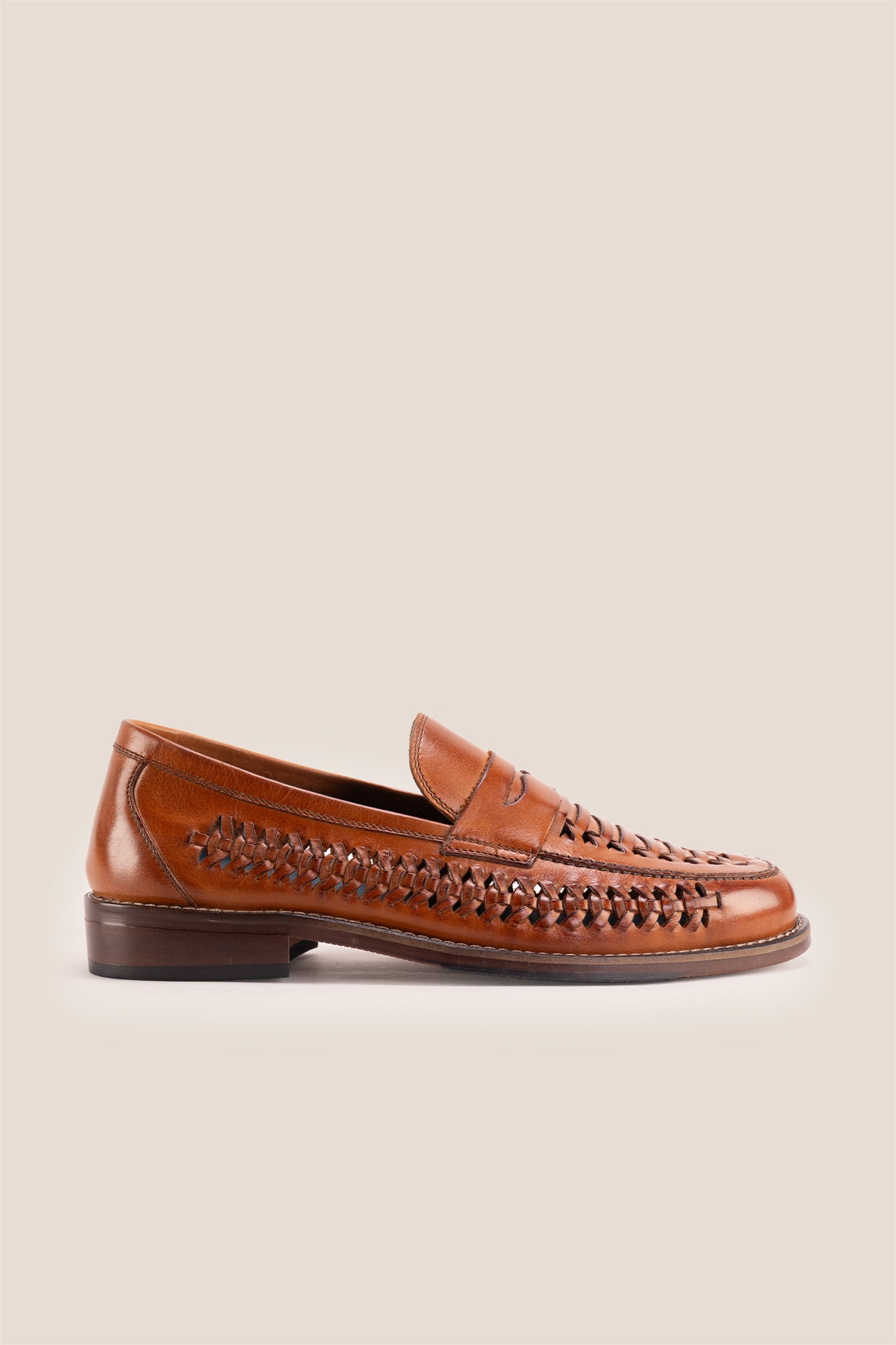 Finley tan woven leather loafer for men, showcasing premium craftsmanship with a sophisticated and timeless design