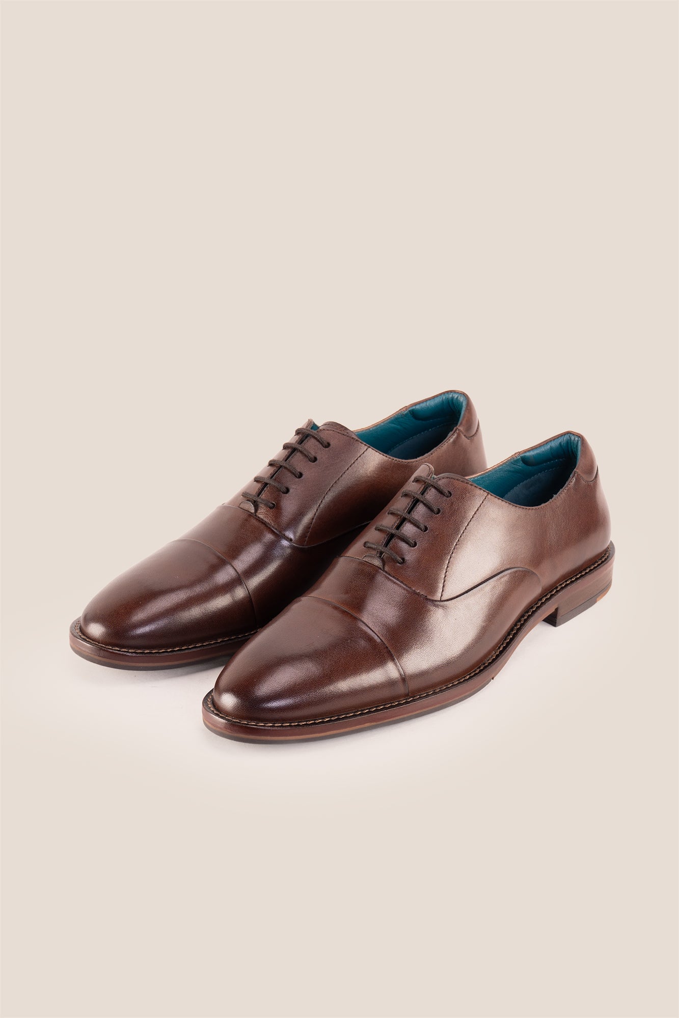 Jarred Brown mens premium leather Oxford shoes featuring a distinctive toecap design and a polished brown finish.