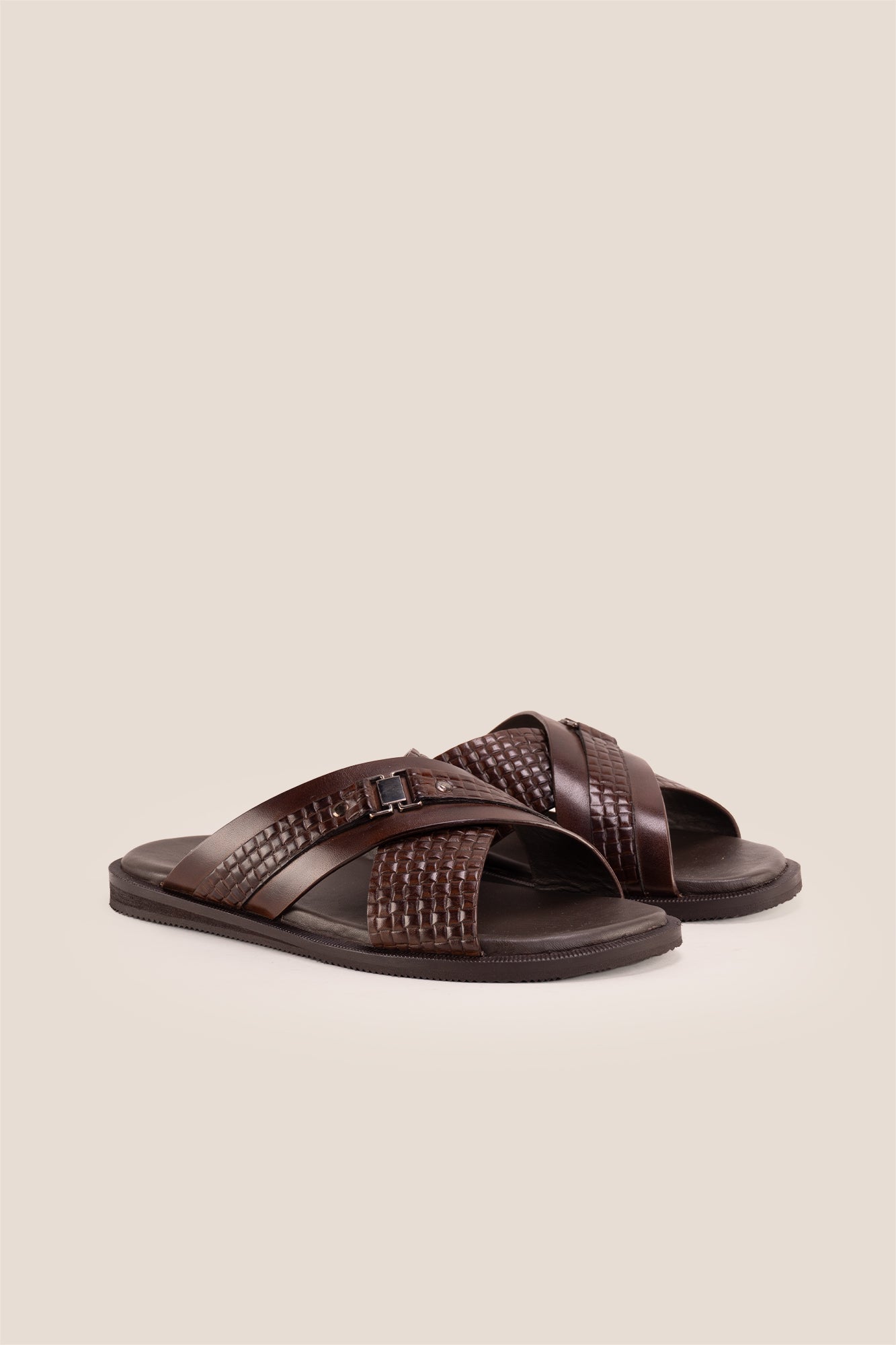 Aiden Brown men’s leather sandals with a unique woven criss-cross strap design.