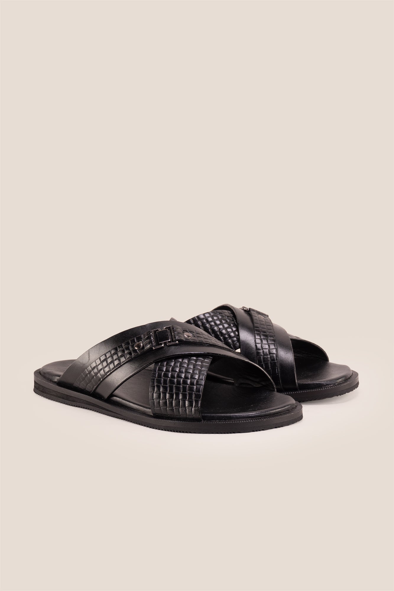Aiden Black men’s leather sandals with a unique woven criss-cross strap design.