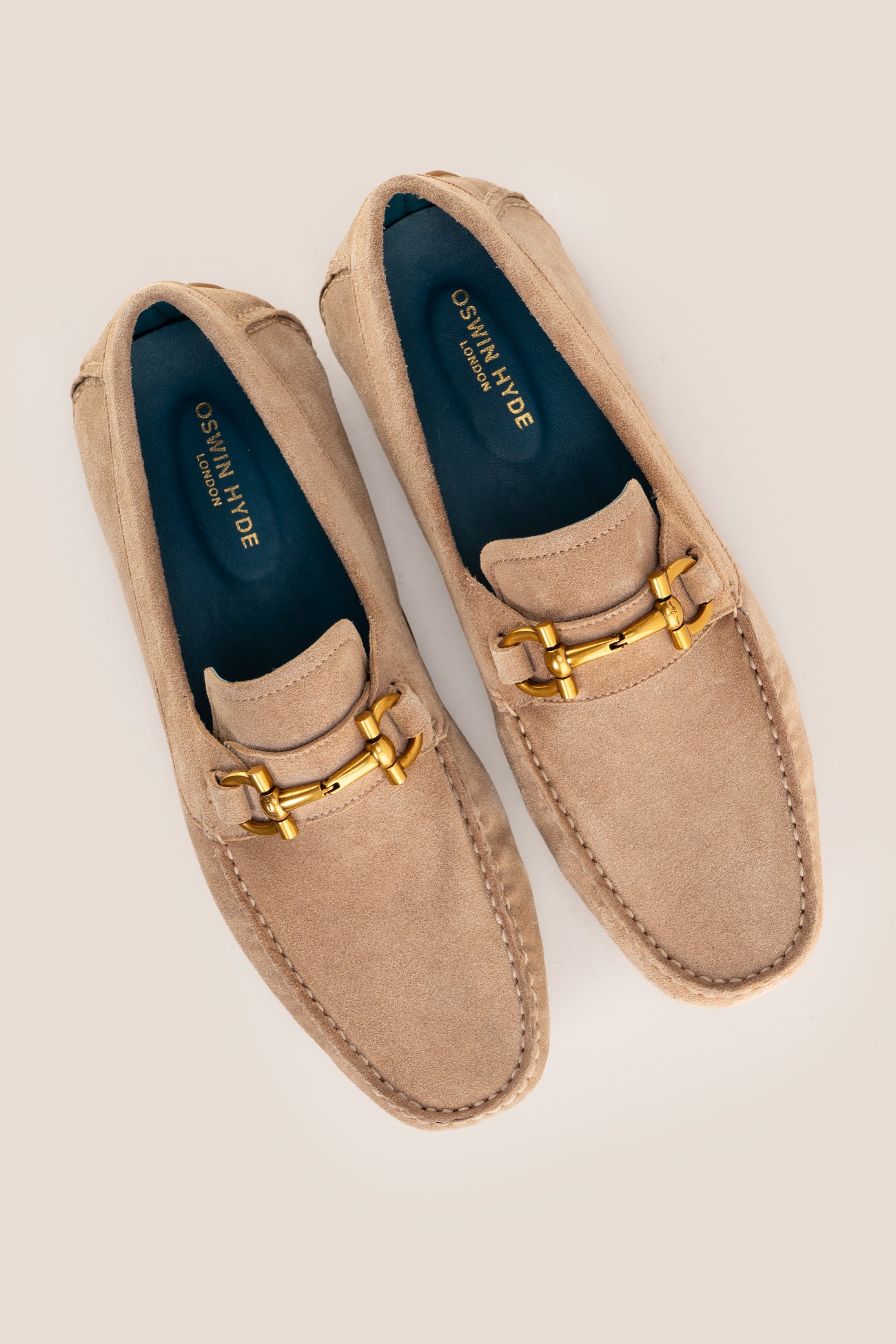 Oswin Hyde Nigel beige suede moccasin loafer with a small gold horsebit detail on the vamp