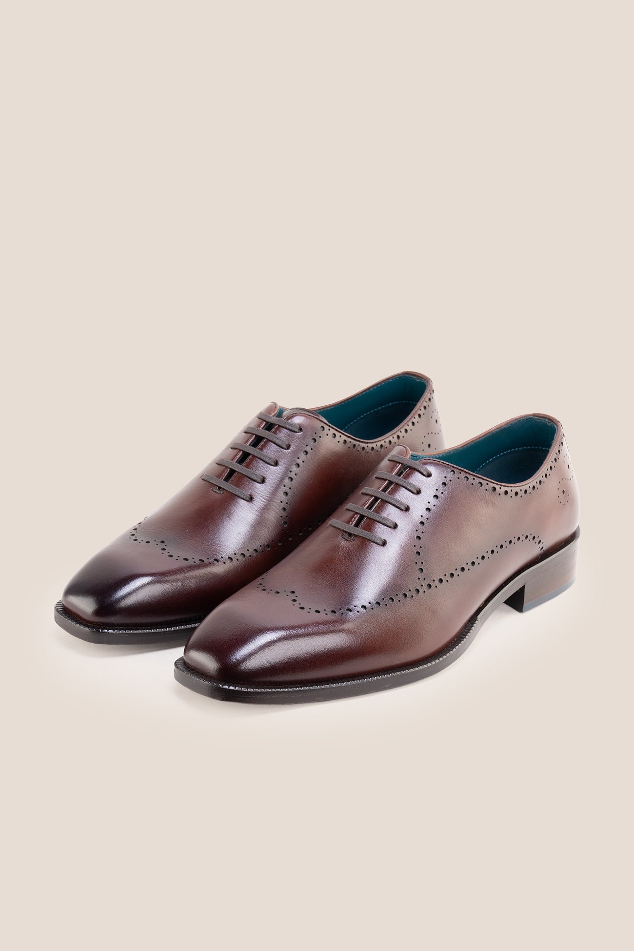 The men's smart brown shoes combine rich leather tones with versatile open-lacing, perfect for business tailoring and smart-casual occasions.