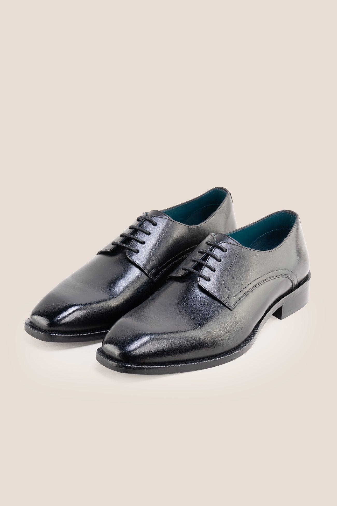 The men's smart black shoes combine timeless elegance with open-lacing comfort, perfect for business tailoring and formal events.