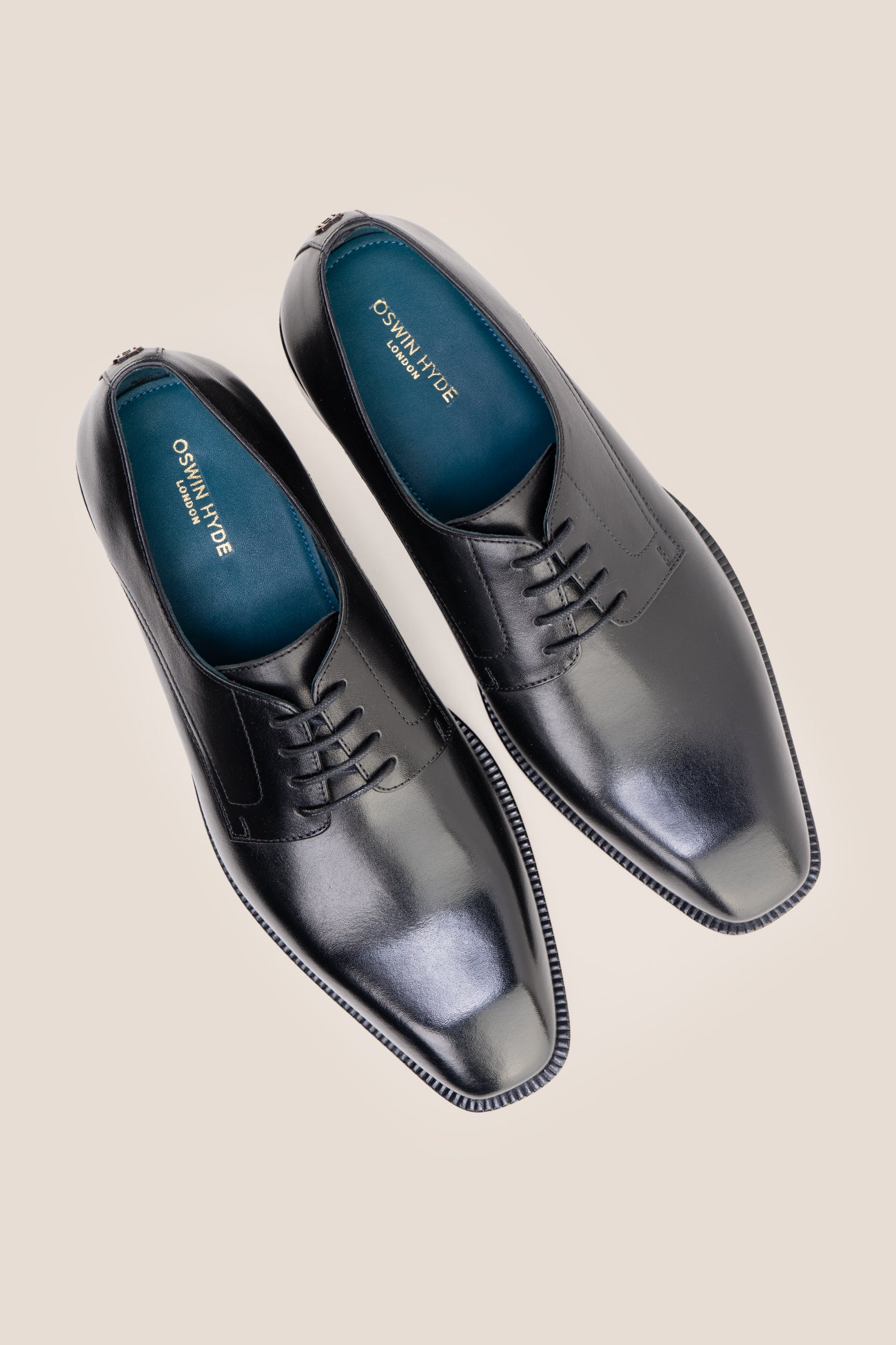 The men's smart black shoes combine timeless elegance with open-lacing comfort, perfect for business tailoring and formal events.