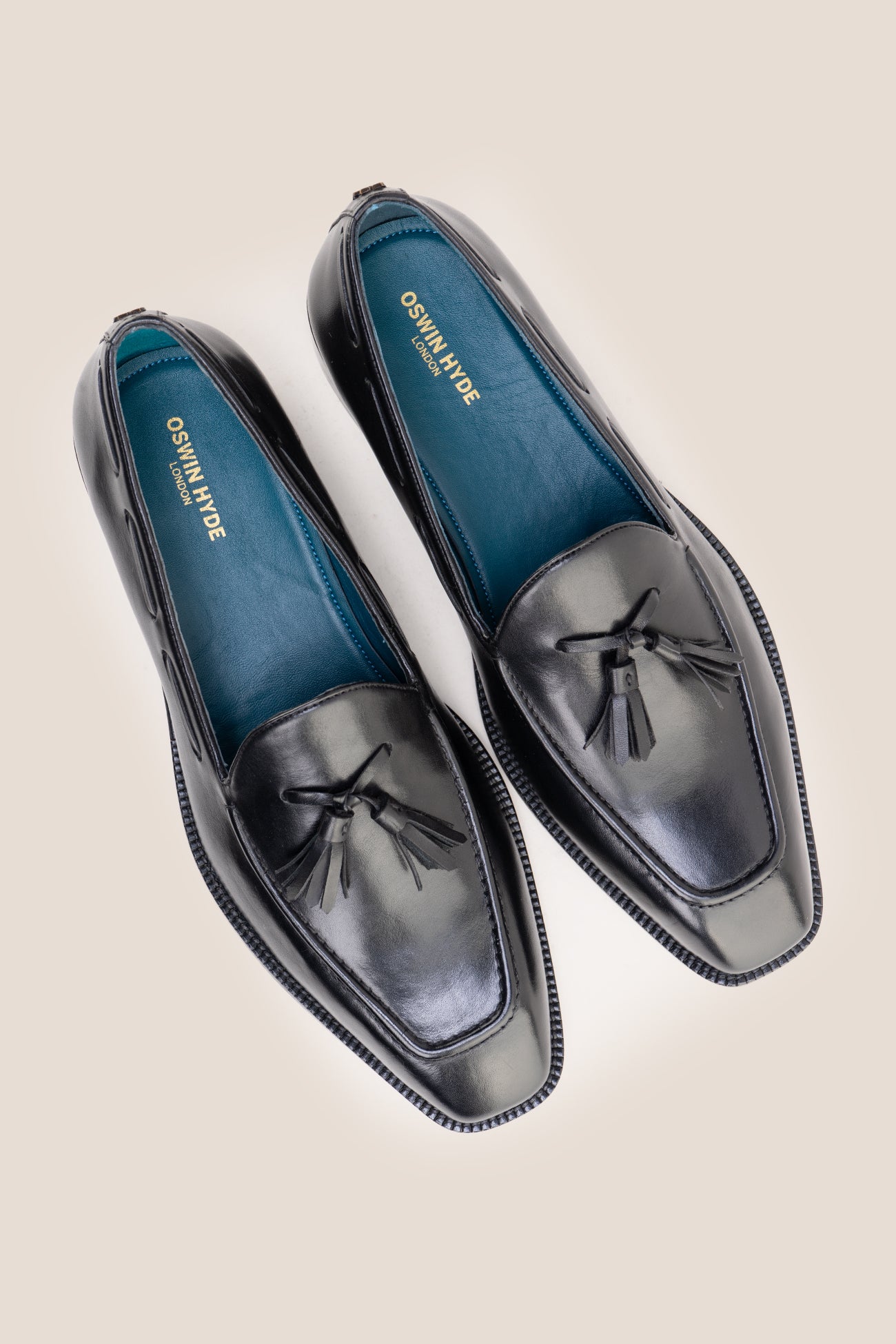The Emmanuel black tassel loafers feature distinctive hand-stitched tassels and premium full-grain leather, perfect for suits, formal occasions, and elevated casual wear.