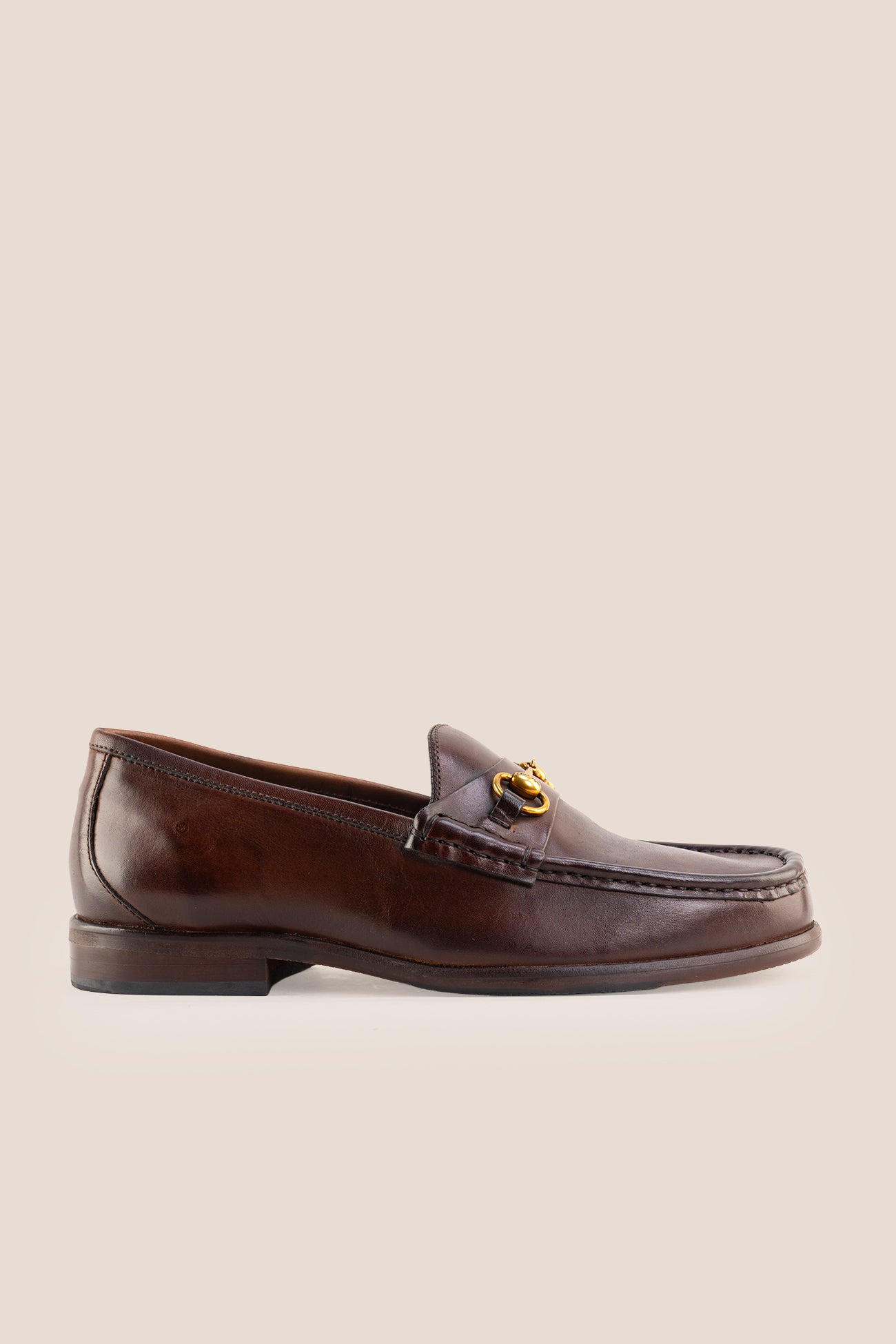 Pair of Oswin Hyde Samuel dark brown leather horsebit loafers with gold buckle detail and teal lining.