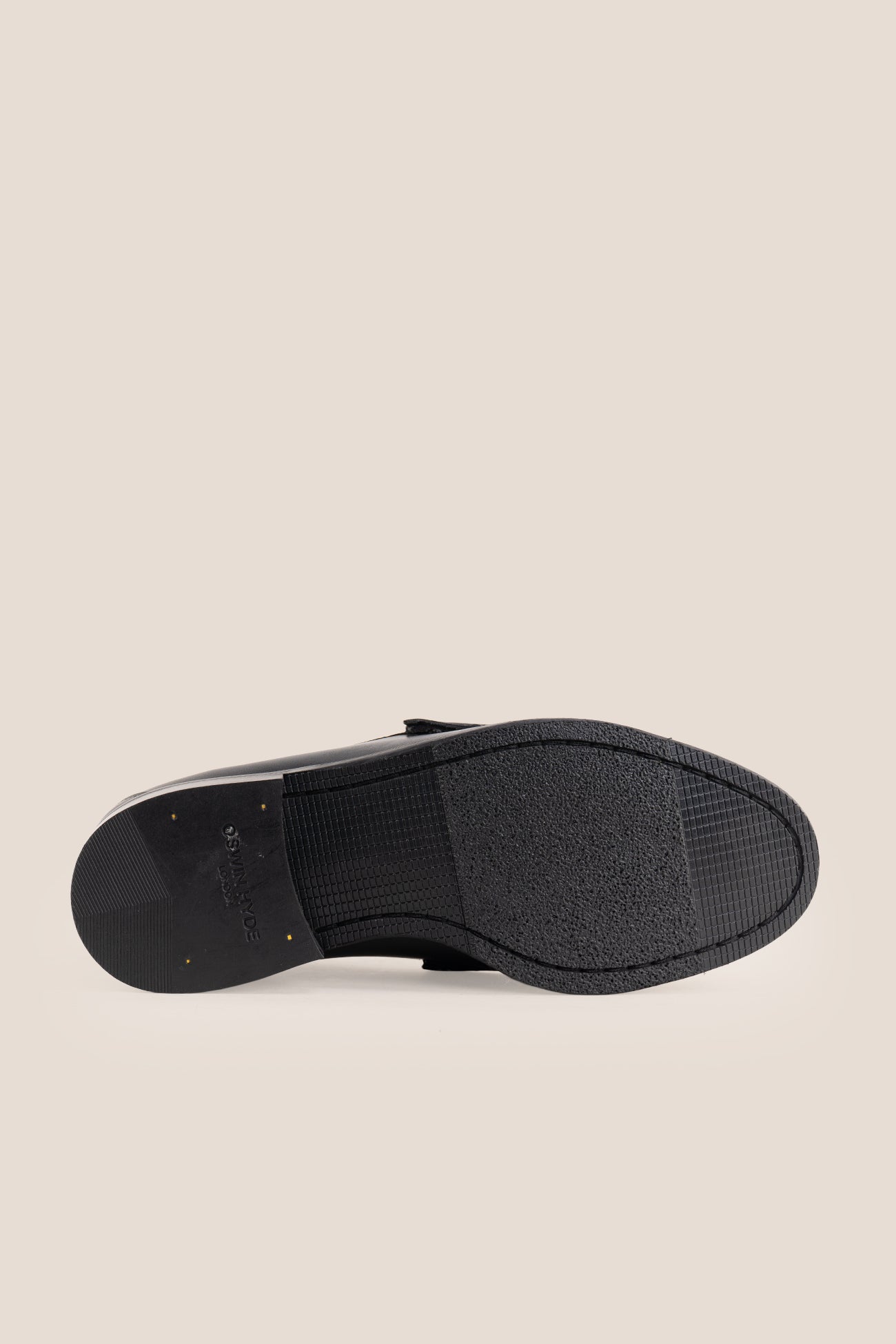 Pair of Oswin Hyde Samuel black leather horsebit loafers with gold buckle detail and teal lining.