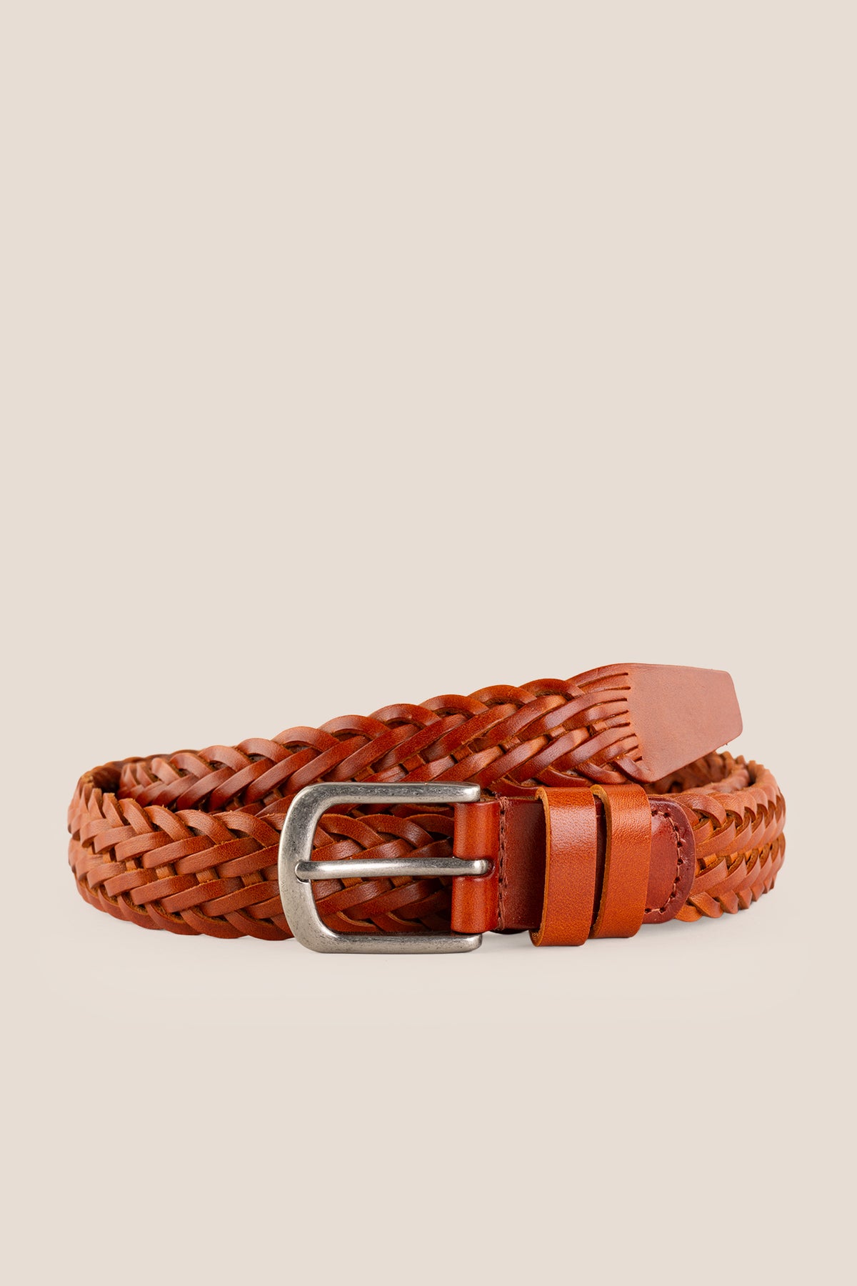 Men's Milo Tan braided leather belt by Oswin Hyde featuring hand-woven leather and a brushed silver buckle