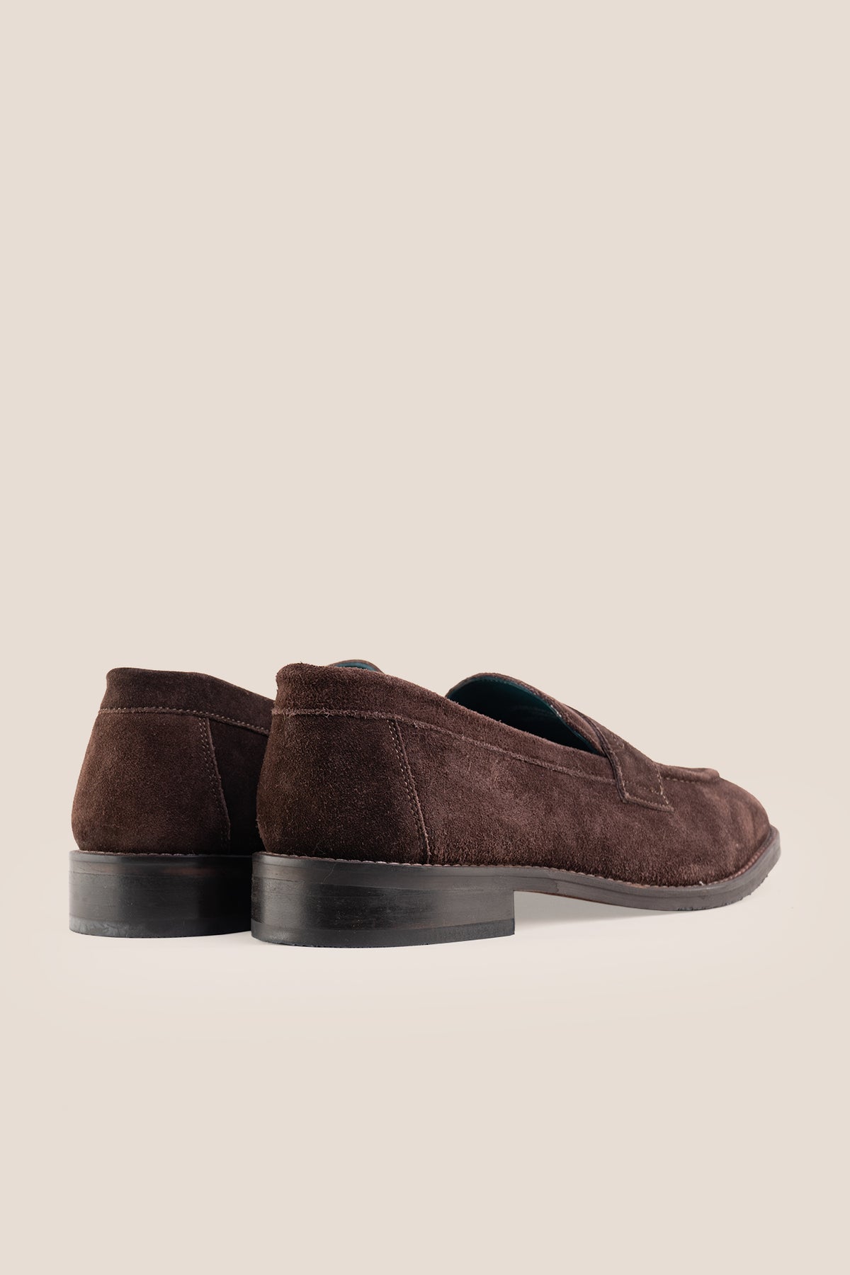 Men's Wyatt Brown Suede penny loafers crafted from premium crust suede leather with a classic slip-on design.