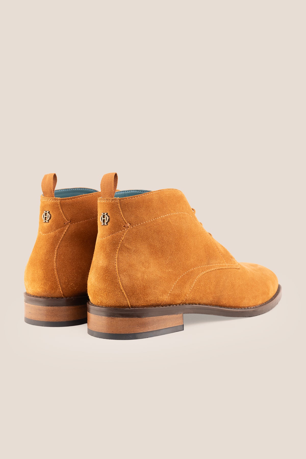 Men's Franklin Tan Suede lace-up ankle boots by Oswin Hyde featuring a soft sand suede finish and sturdy heel.