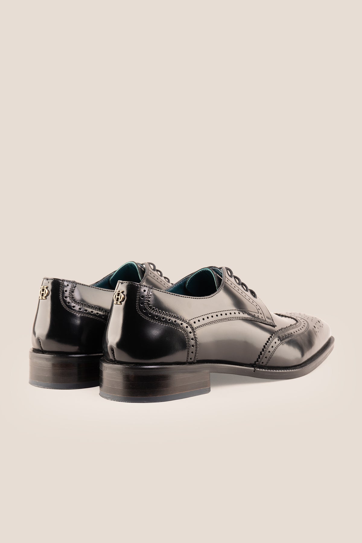 Men's Gabriel Black leather wingtip Derby dress shoes by Oswin Hyde featuring high-shine black leather and lace-up closure.
