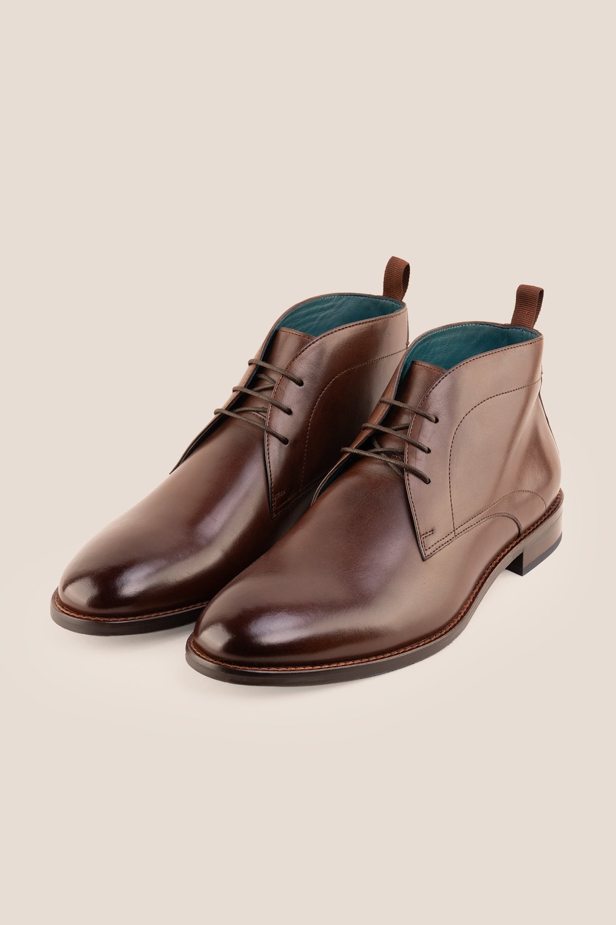 Men's Franklin Brown leather lace-up ankle boots by Oswin Hyde featuring a polished chestnut leather finish and sturdy heel.