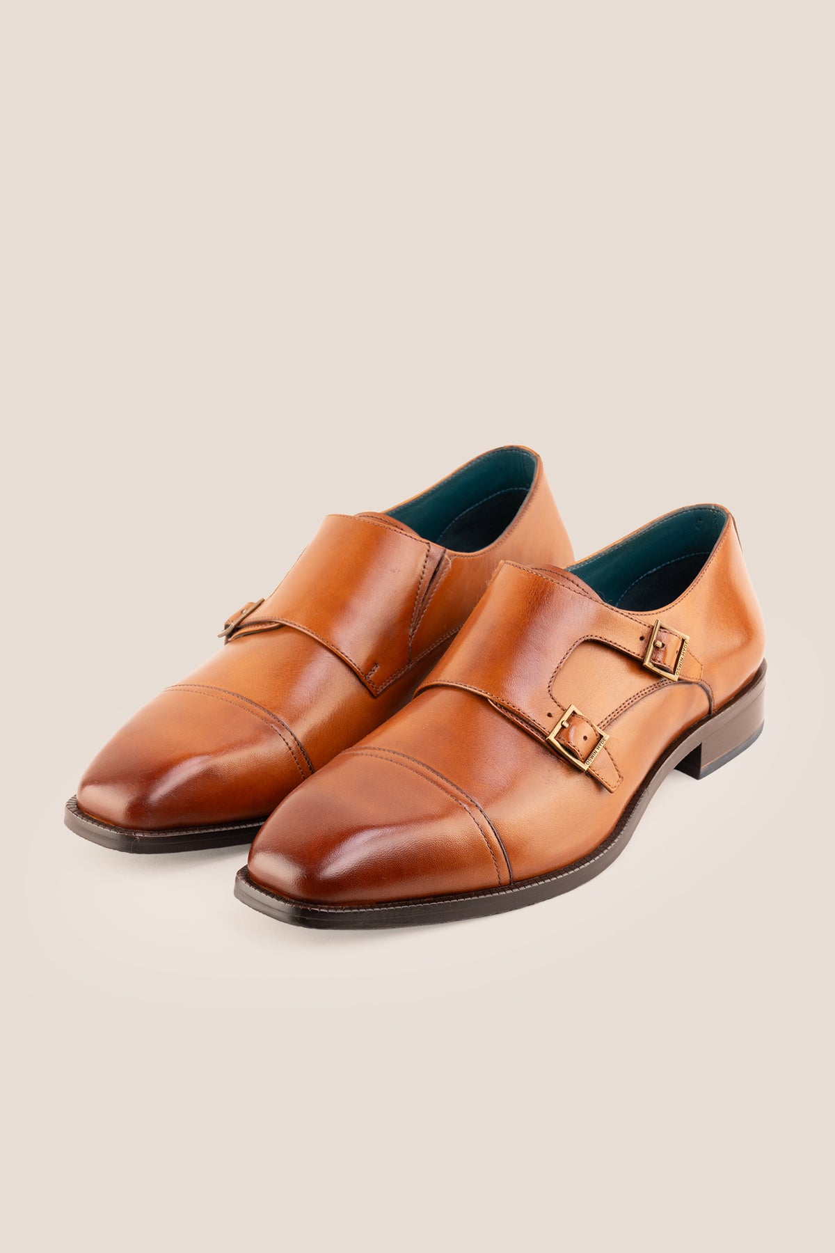 Men's Rolf Tan leather double monk strap dress shoes by Oswin Hyde featuring burnished tan leather and dual buckle straps.