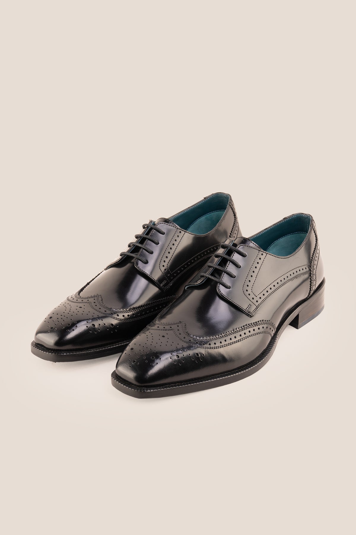 Men's Gabriel Black leather wingtip Derby dress shoes by Oswin Hyde featuring high-shine black leather and lace-up closure.