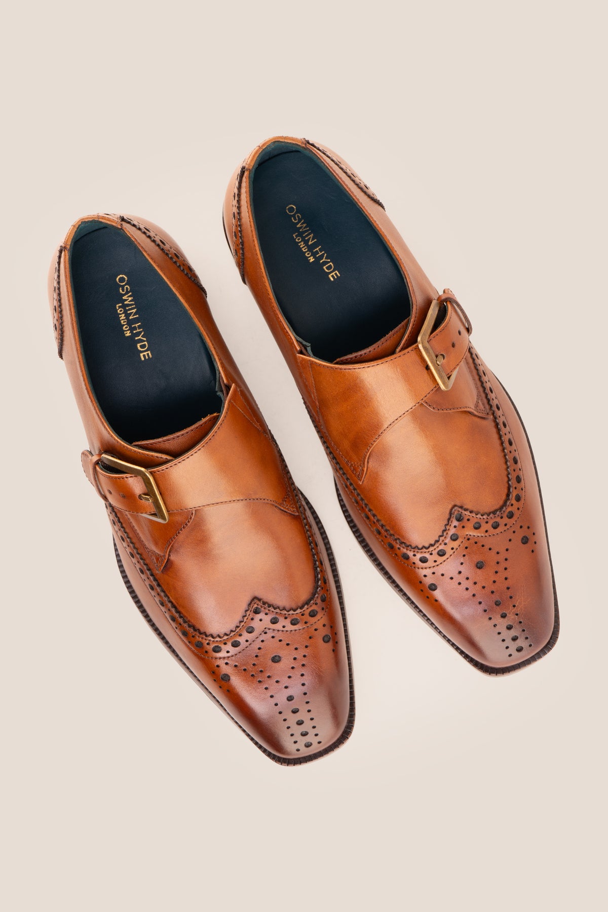 Men's Godric Tan leather monk strap brogue dress shoes by Oswin Hyde featuring burnished tan leather and a buckle strap.