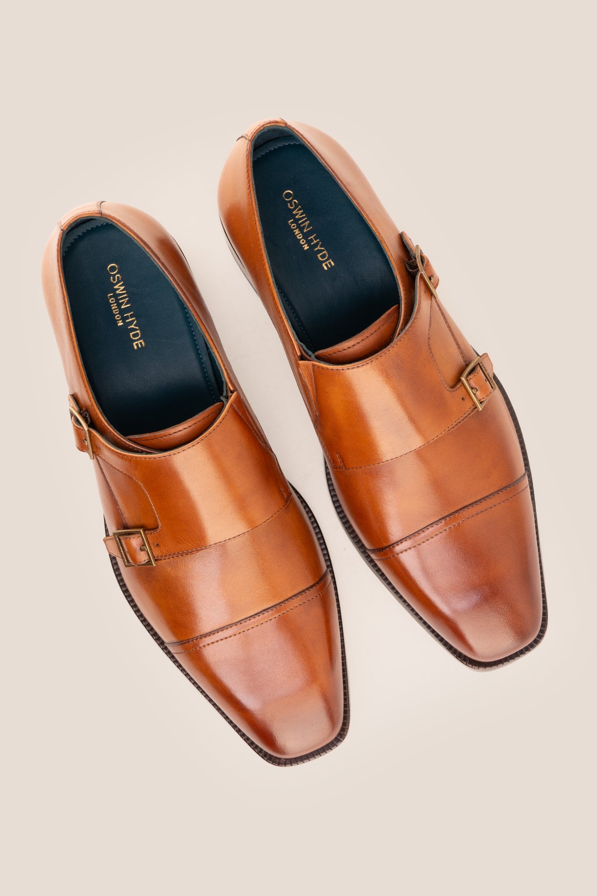 Men's Rolf Tan leather double monk strap dress shoes by Oswin Hyde featuring burnished tan leather and dual buckle straps.