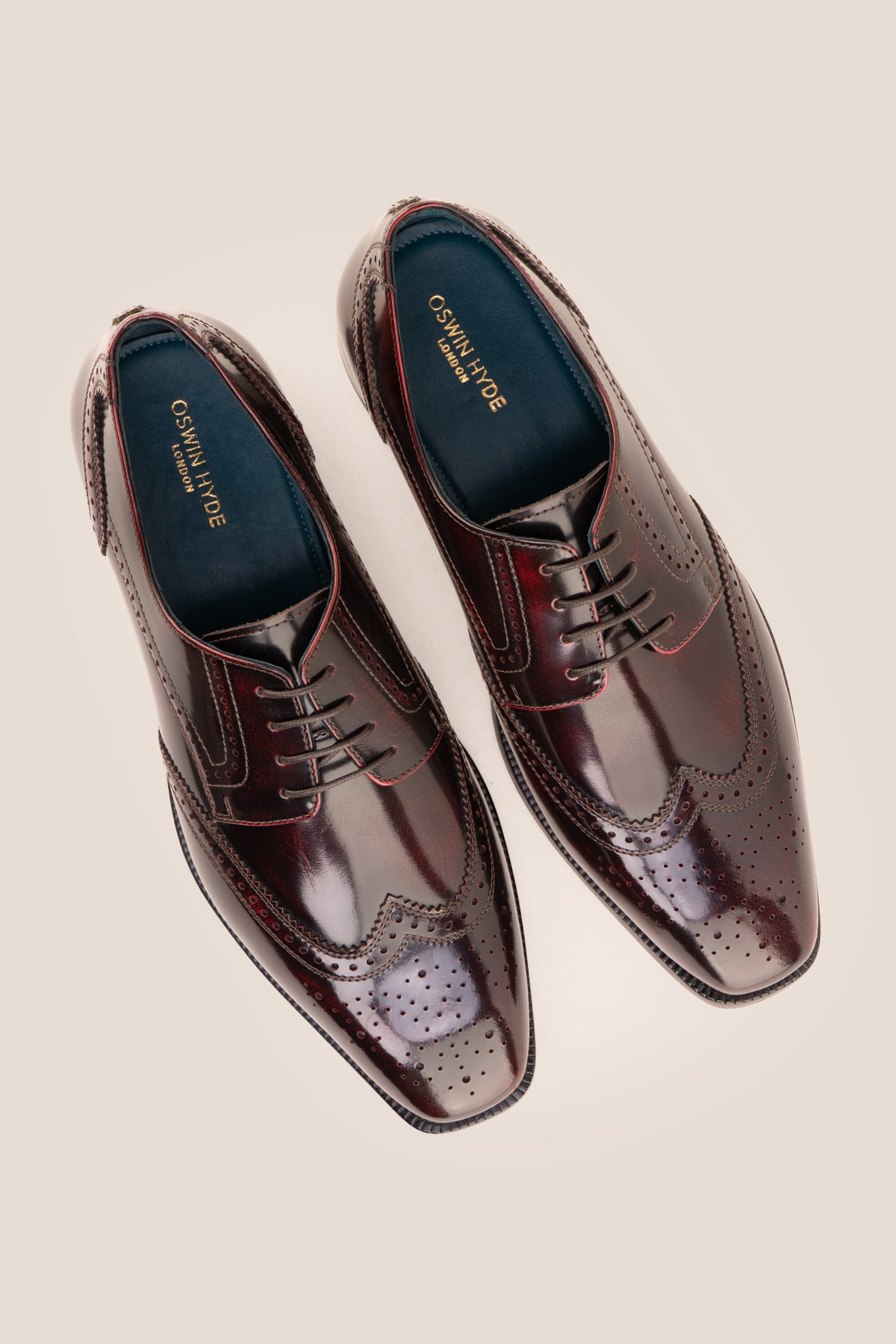 Men's Gabriel Bordo leather wingtip Derby dress shoes by Oswin Hyde featuring rich burgundy leather and lace-up closure.