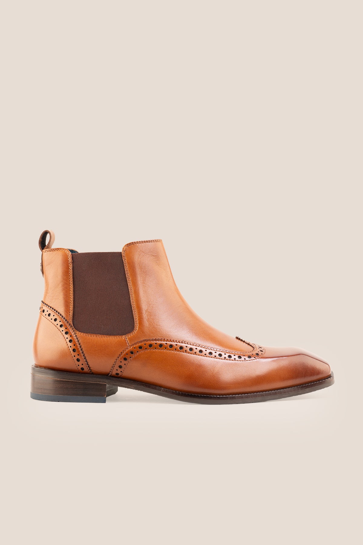 Men's Edgar Tan leather brogue Chelsea boots by Oswin Hyde featuring wingtip detailing and elastic side gussets.