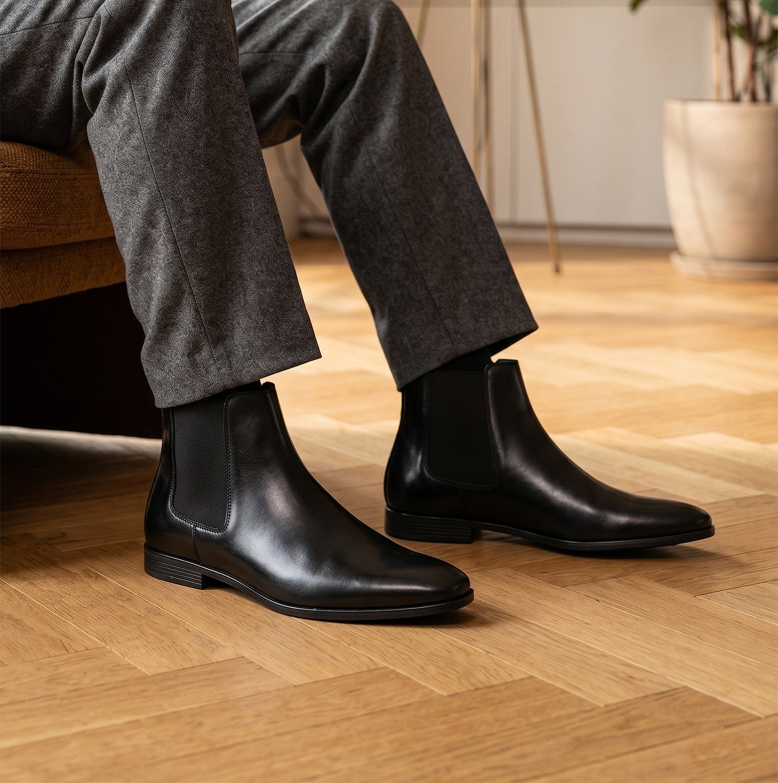 Man wearing Darwin mens Leather Chelsea boots in Black, ideal for weddings, casual and formal events. 