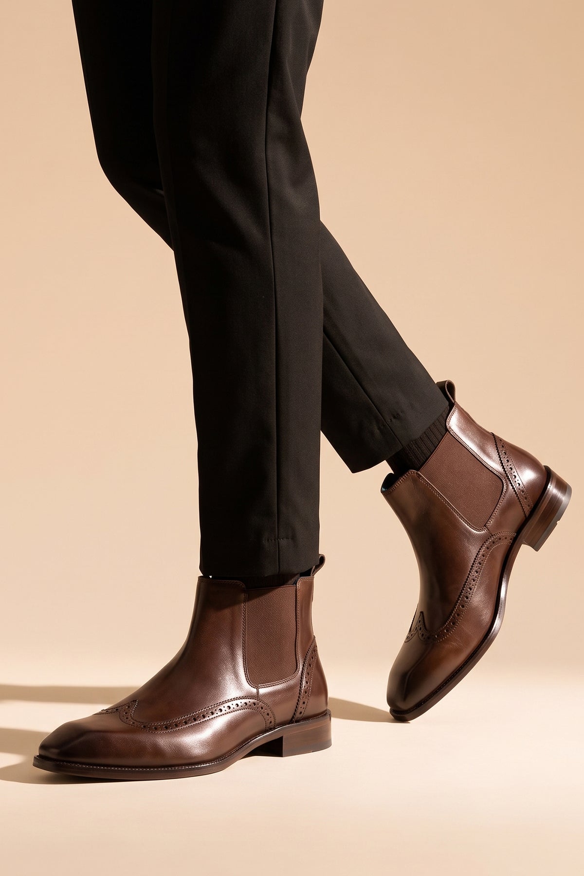 Men's Edgar Brown leather brogue Chelsea boots by Oswin Hyde featuring wingtip detailing and elastic side gussets.