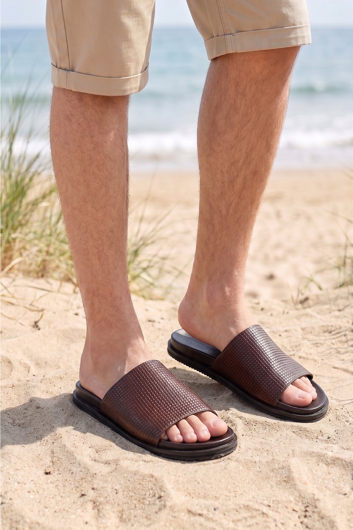 Model wearing Tito Brown leather sandals slide for men by Oswin Hyde with sleek design and comfortable fit