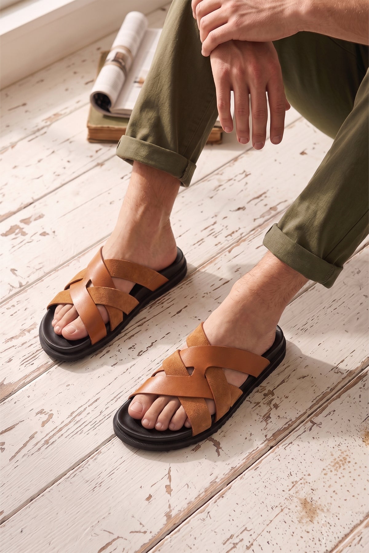 Men’s Rowan Tan slide sandals featuring a soft suede leather X-strap design and an earthy tan finish.