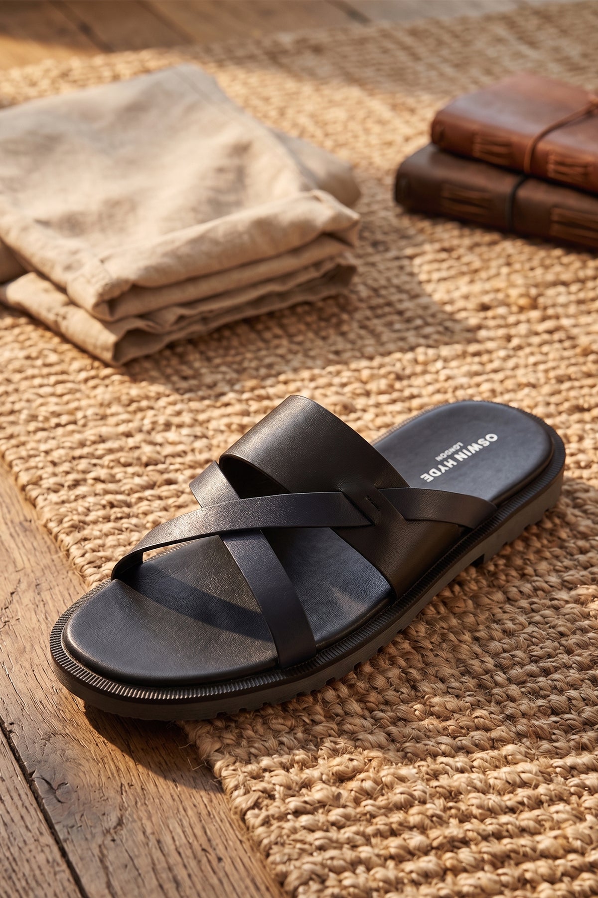 Men’s Frank Black tri-strap sandals featuring a robust adjustable strap system and a refined leather finish.