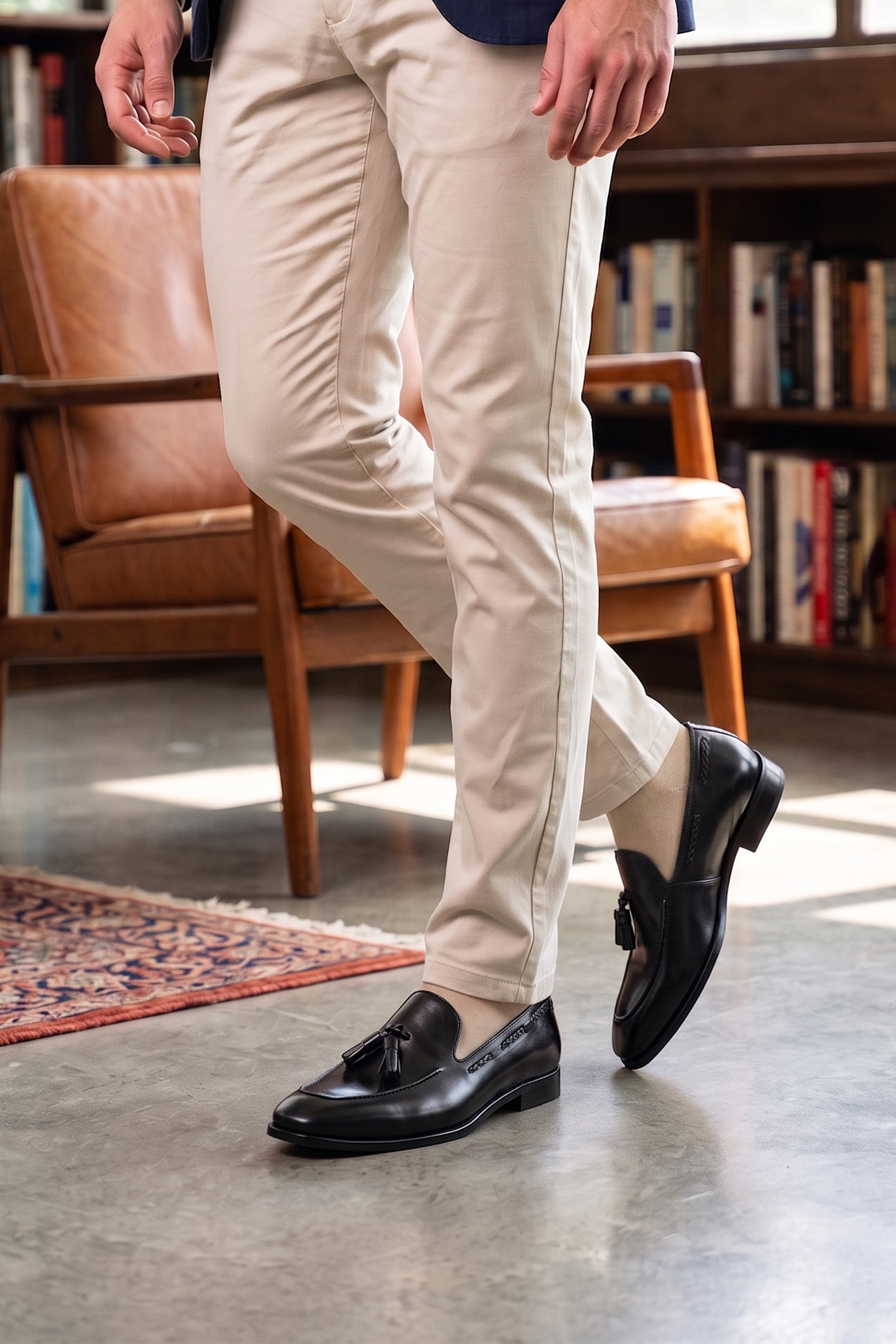 The Emmanuel black tassel loafers feature distinctive hand-stitched tassels and premium full-grain leather, perfect for suits, formal occasions, and elevated casual wear.