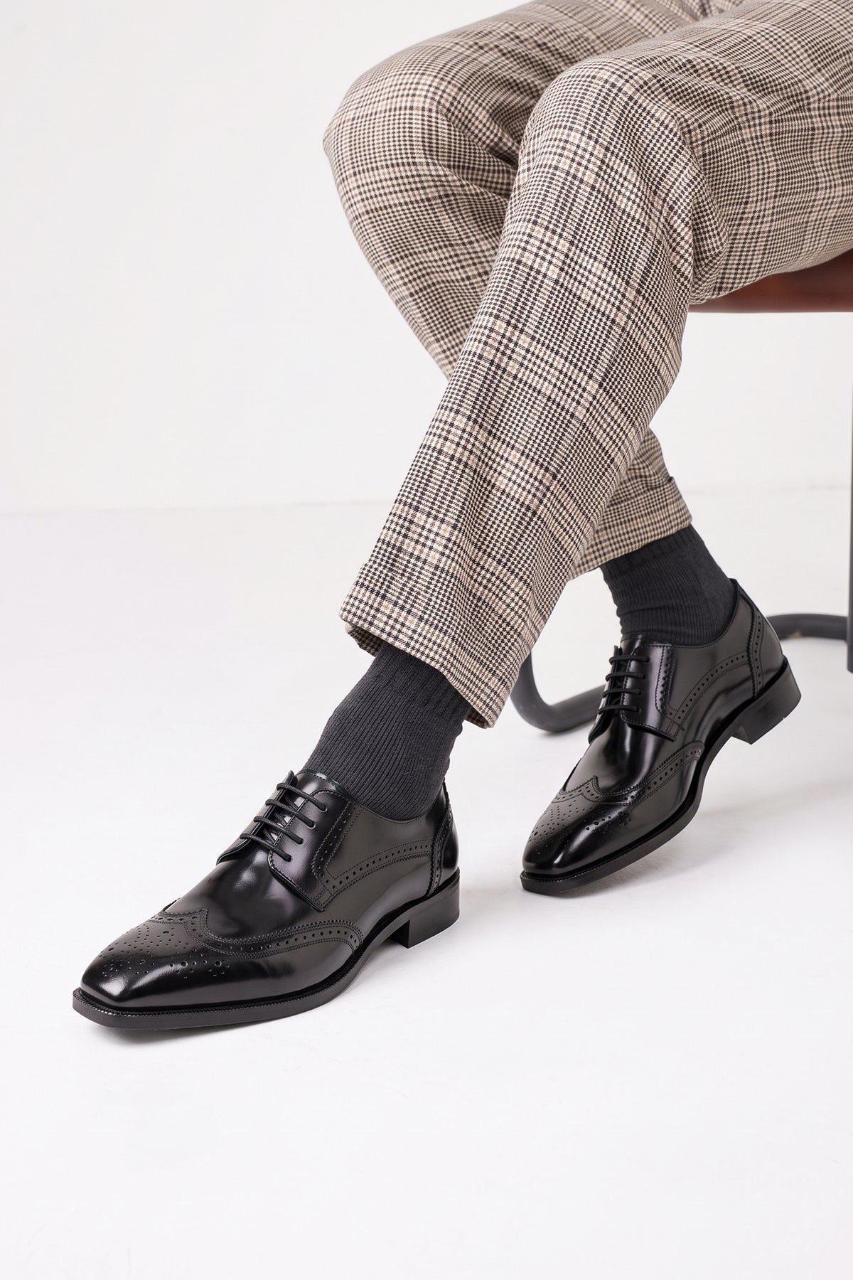 Men's Gabriel Black leather wingtip Derby dress shoes by Oswin Hyde featuring high-shine black leather and lace-up closure.