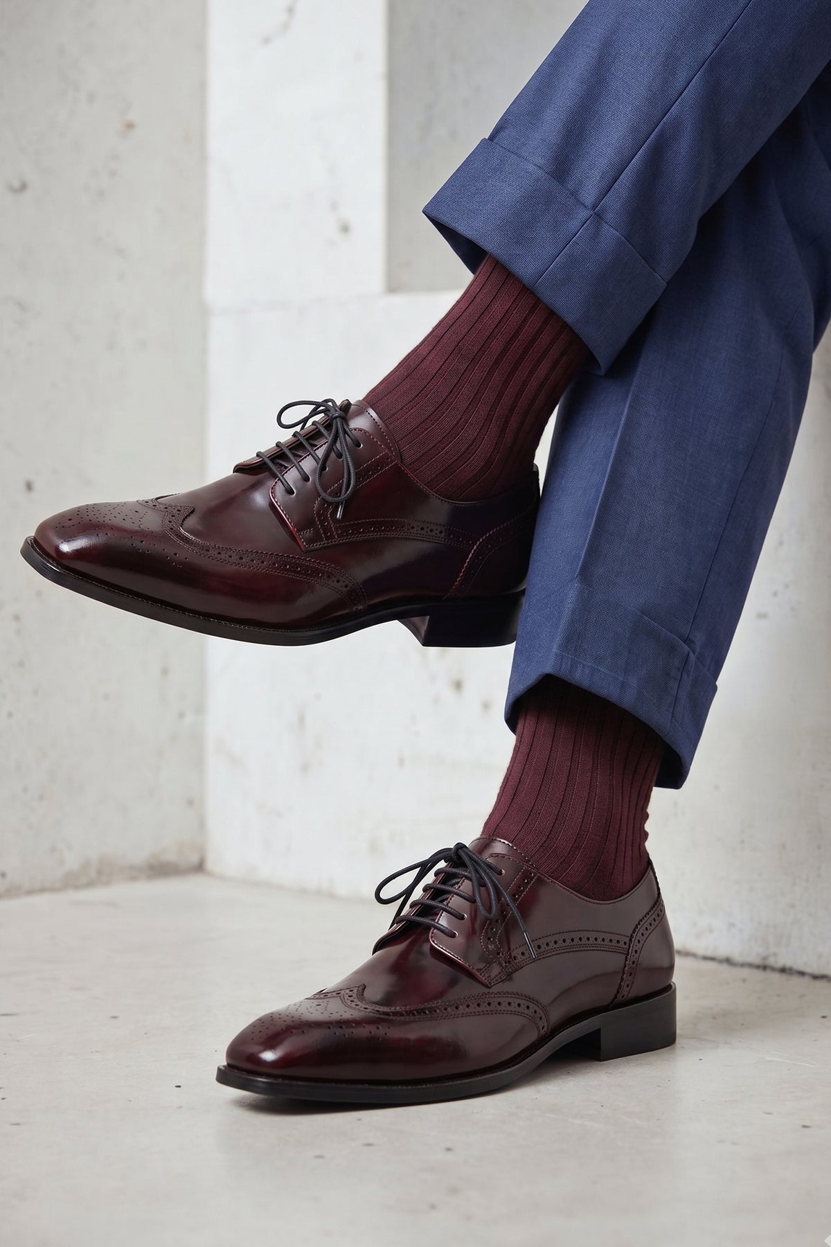 Men's Gabriel Bordo leather wingtip Derby dress shoes by Oswin Hyde featuring rich burgundy leather and lace-up closure.