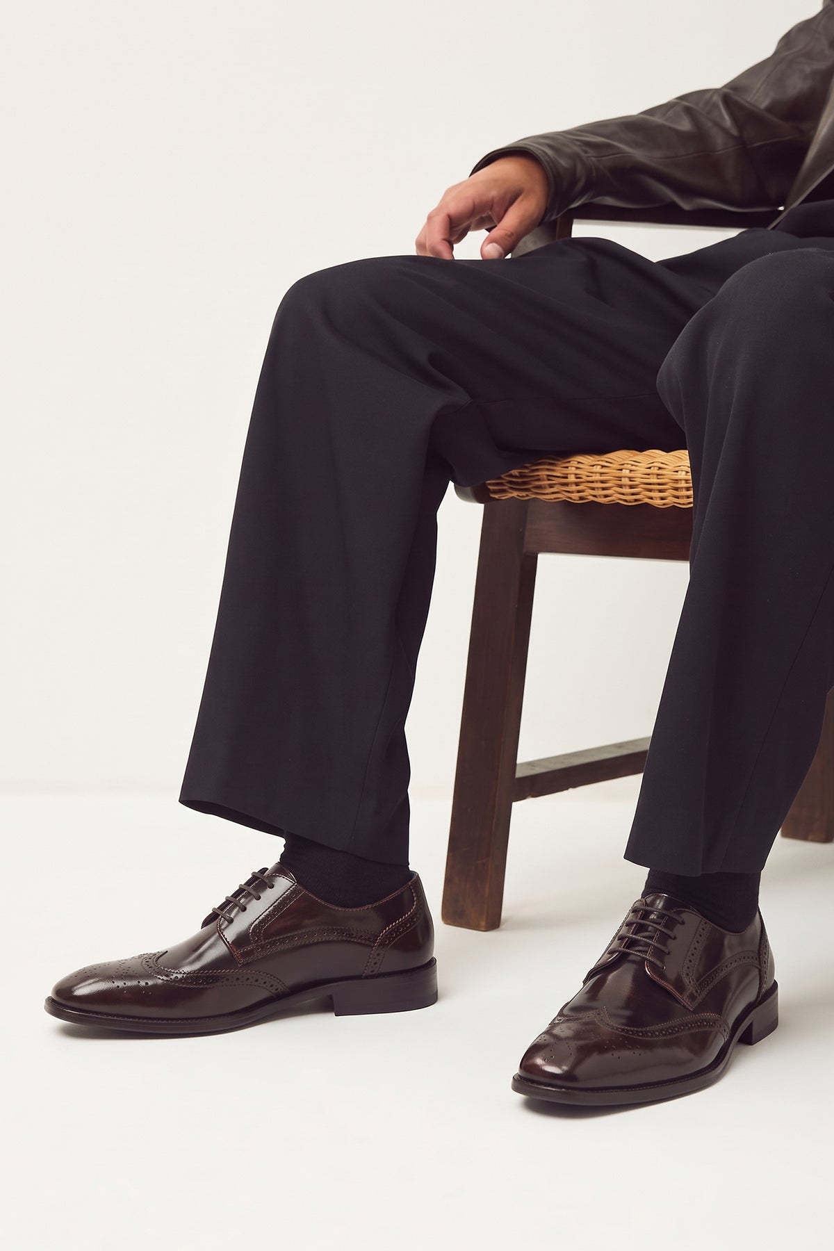 Men's Gabriel Tan leather wingtip Derby dress shoes by Oswin Hyde featuring burnished tan leather and lace-up closure.