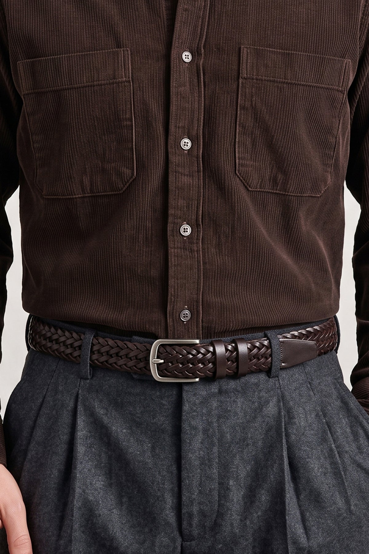  Milo brown woven leather strap ends and brushed metal single-prong buckle.