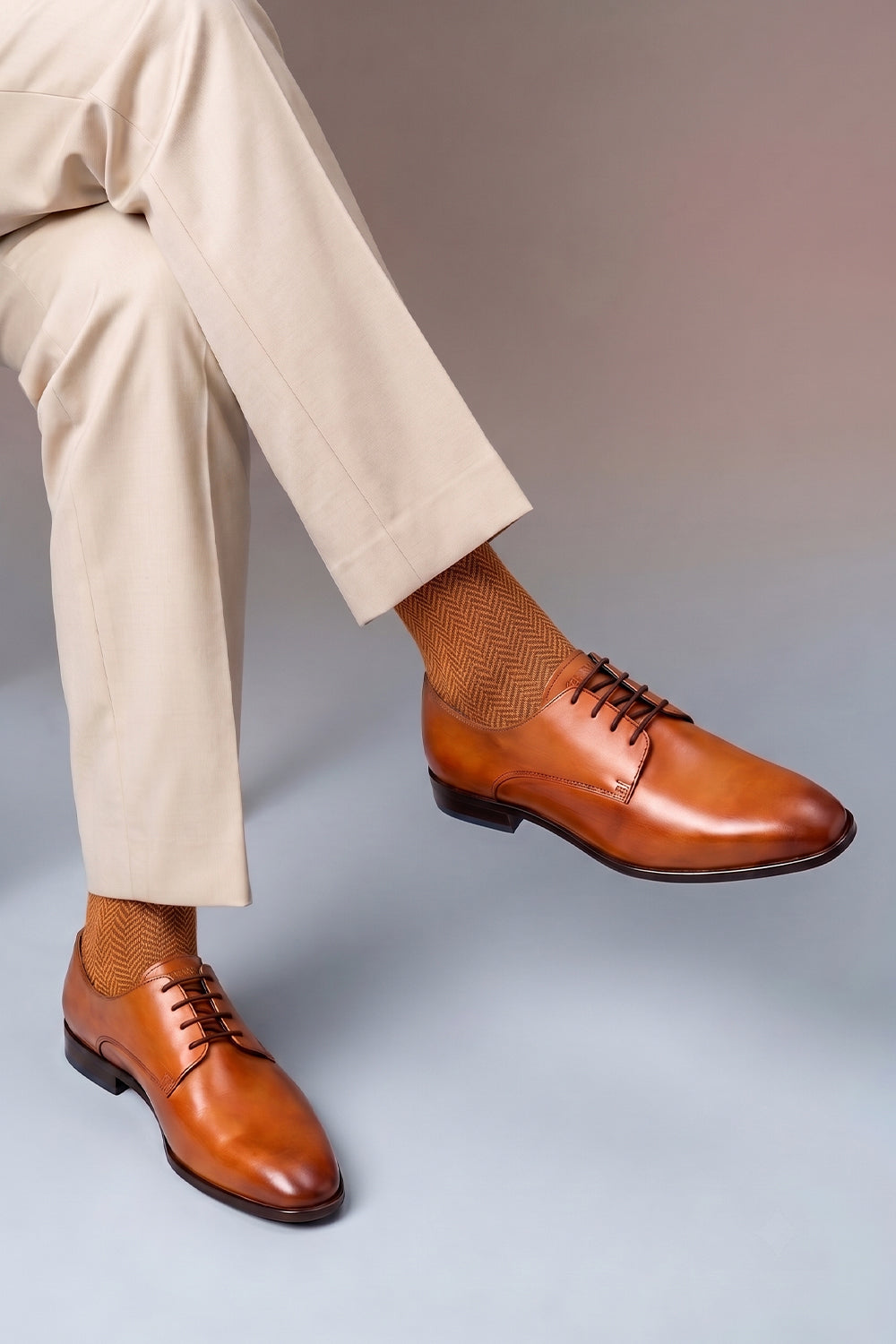 Model wearing Premium herringbone socks designed by Oswin Hyde for the discerning gentleman.