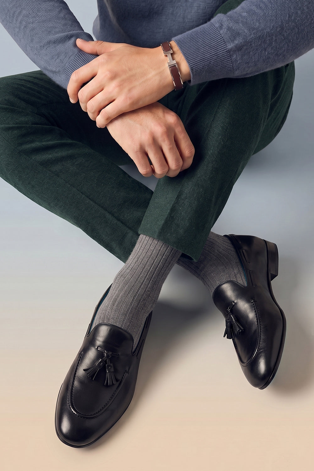 Model wearing Premium Grey cotton socks designed by Oswin Hyde for the discerning gentleman.