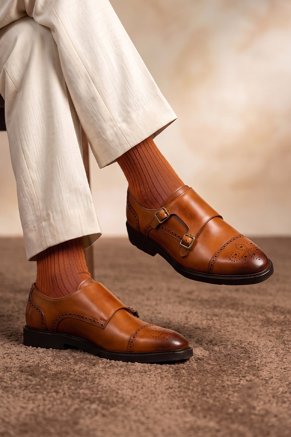 Model wearing Premium solid socks designed by Oswin Hyde for the discerning gentleman.