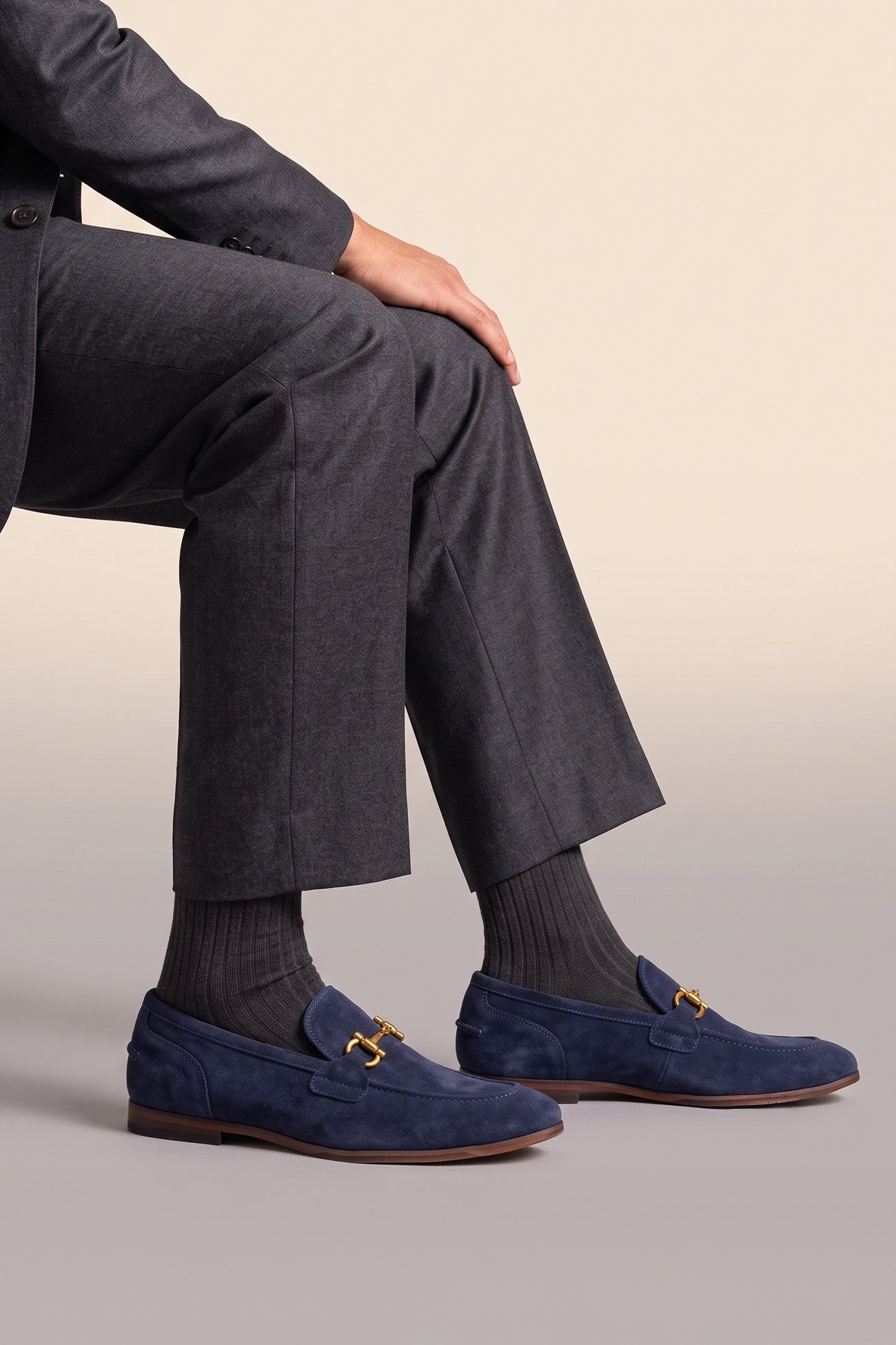 Model wearing Horsebit men's Navy Suede Premium Loafers by Oswin Hyde with contemporary design and comfort.