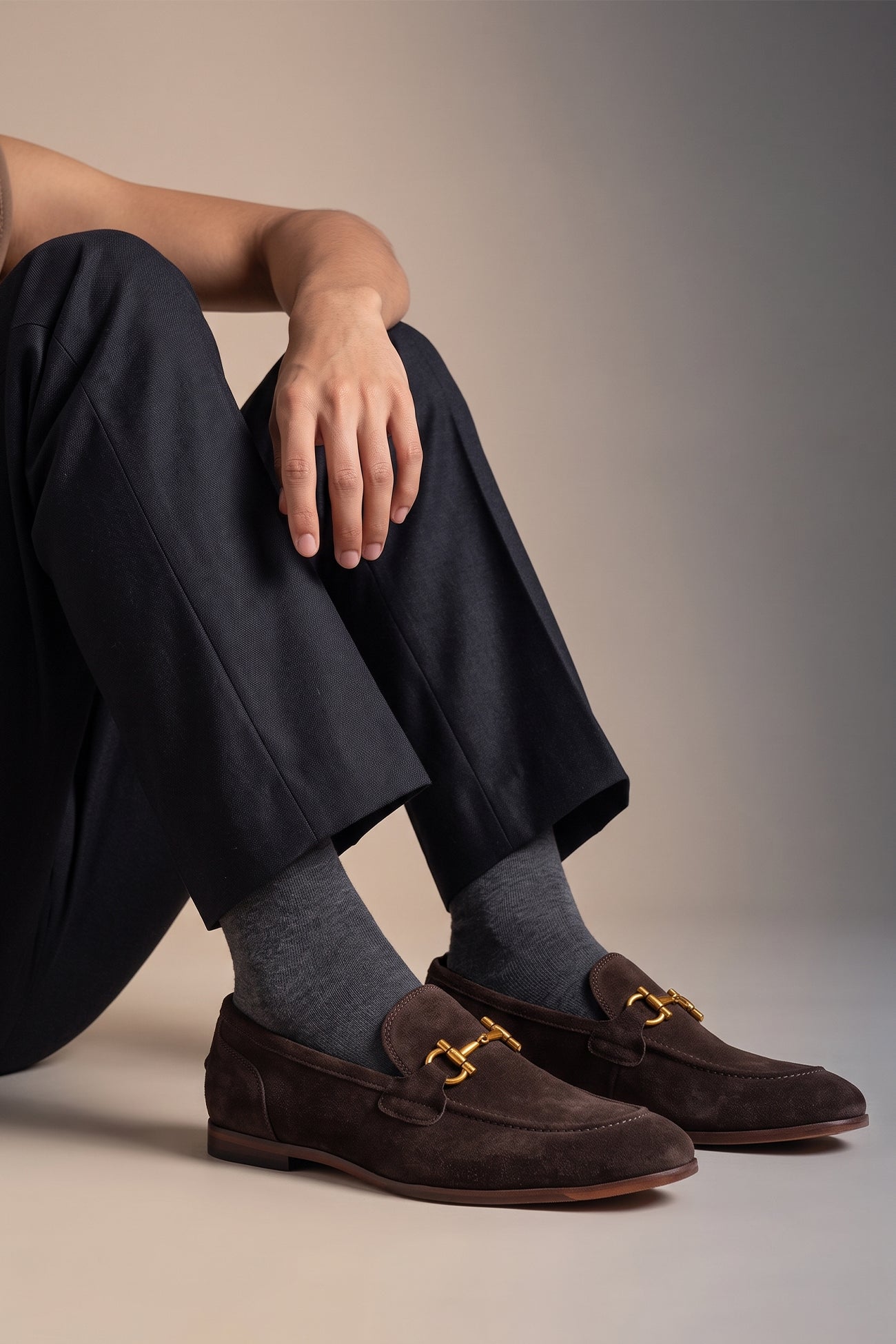 Man wearing Horsebit men's Brown Suede Premium Loafers by Oswin Hyde with contemporary design and comfort.
