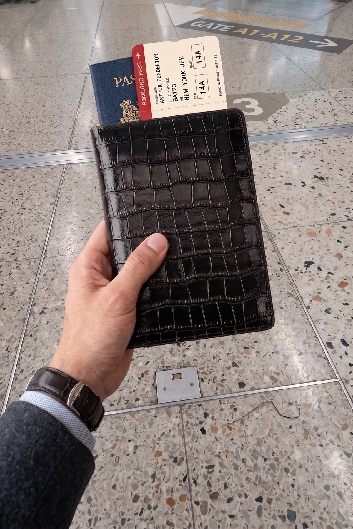 Man holding Covent Black Croc Passport Holder | Oswin Hyde
