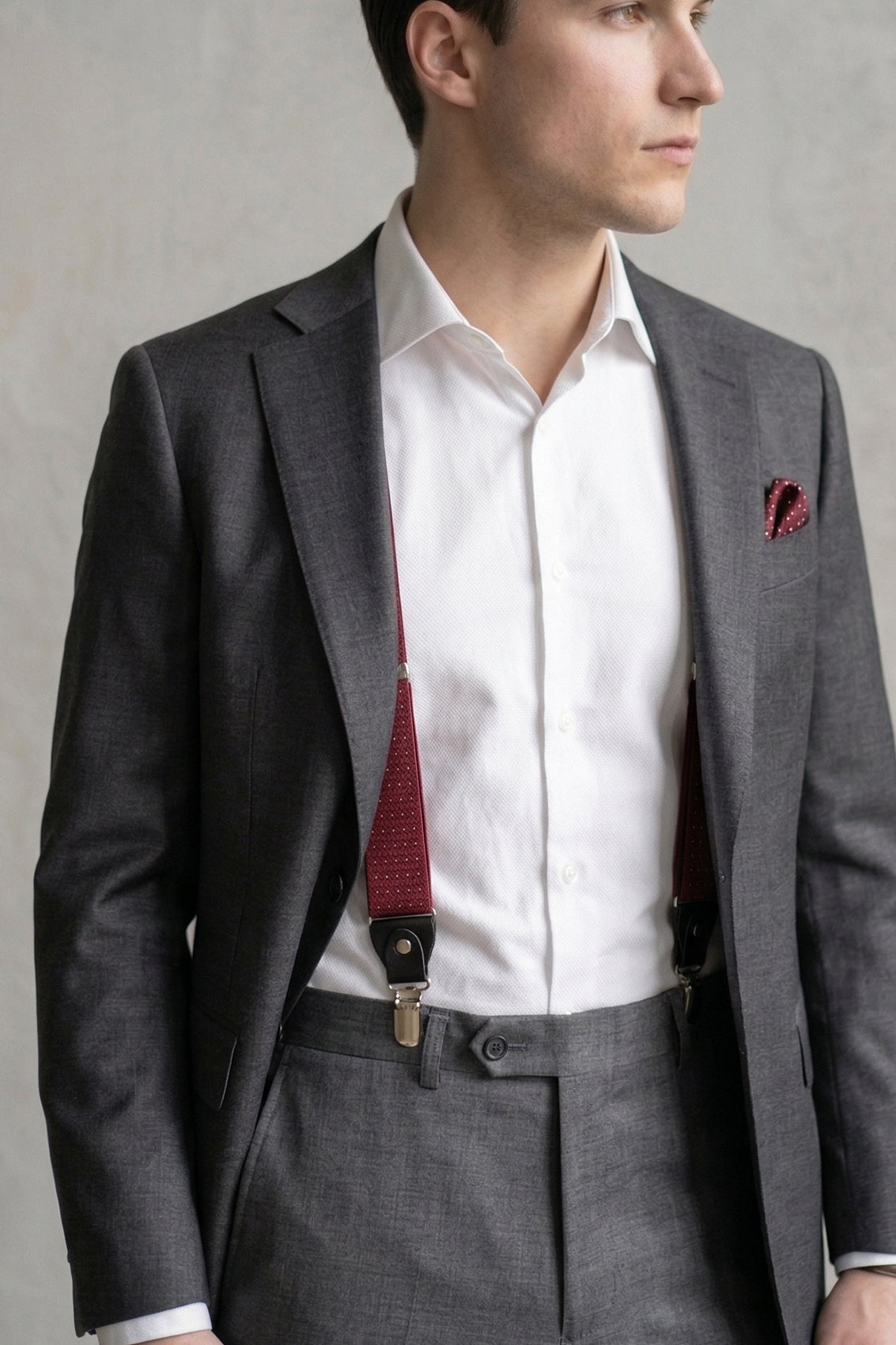 Men’s red polka dot clip-on braces with elastic straps and secure metal clips, ideal for weddings, business attire, or stylish everyday looks.