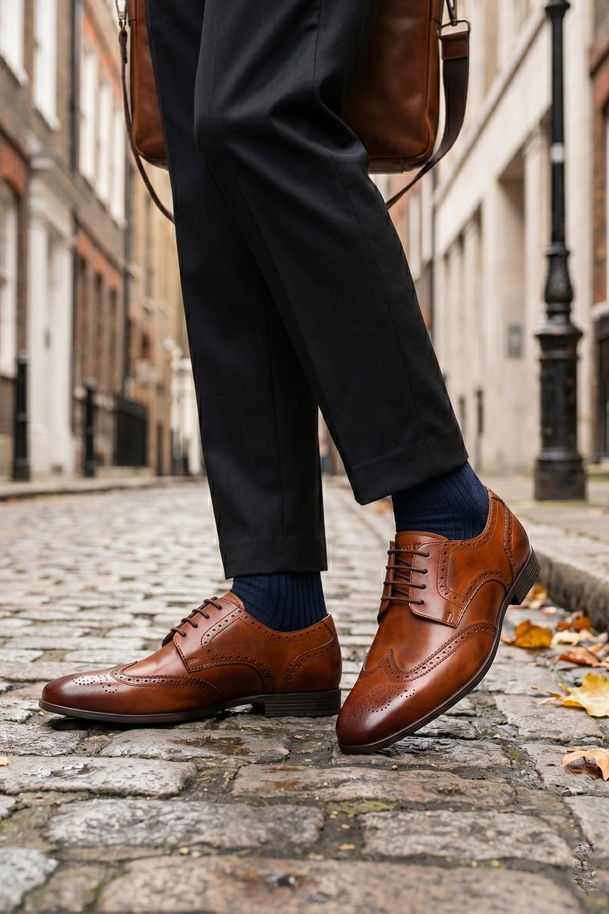 Model wearing Miller Tan sophisticated derby brogue showcases expert craftsmanship that refuses to compromise on style or comfort.