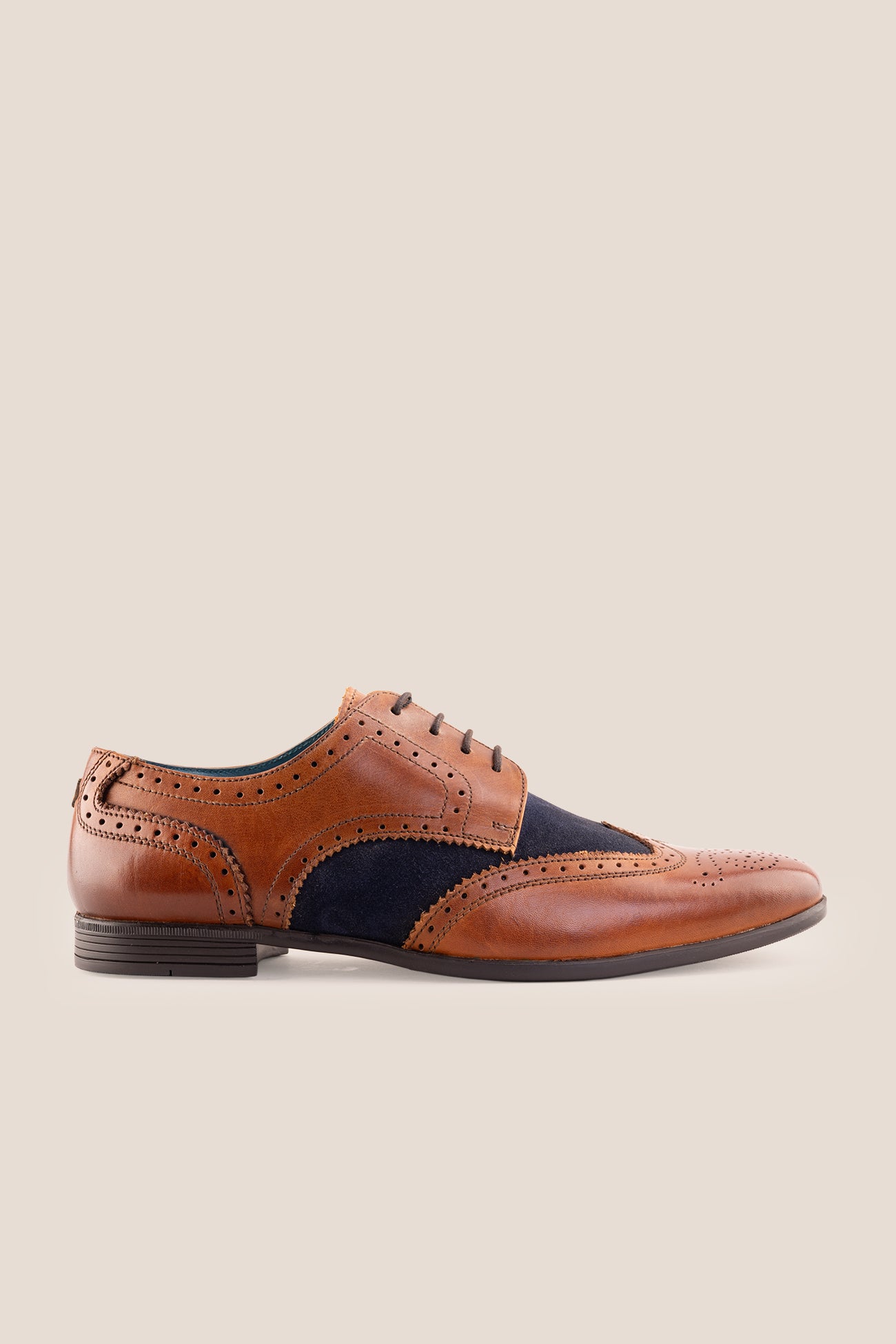 Miller Tan Navy Suede men’s leather and  navy suede brogue shoes with wingtip detailing.