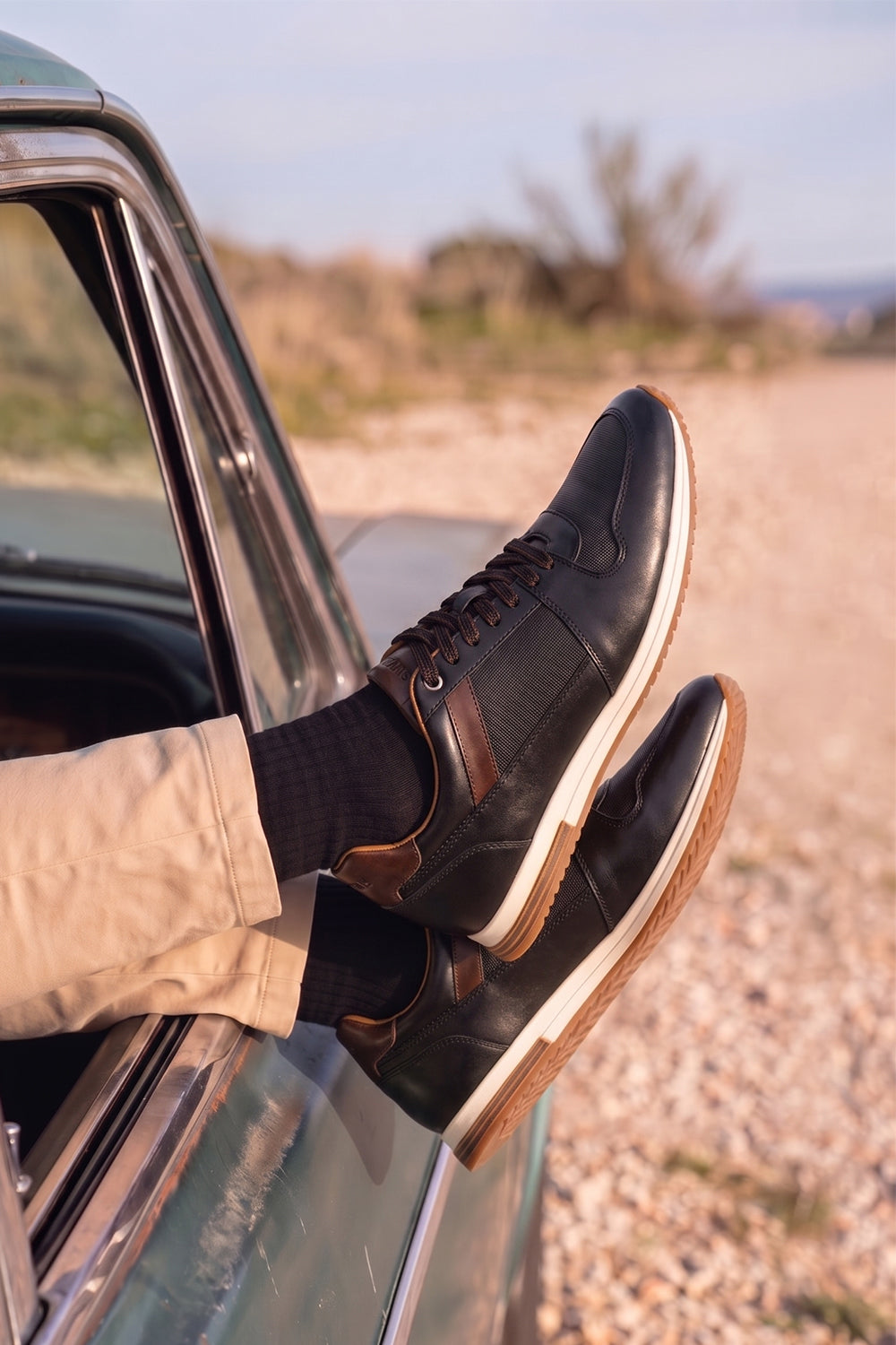 Rory black leather sneakers for men with smooth finish and minimalist design, ideal for casual and smart-casual wear